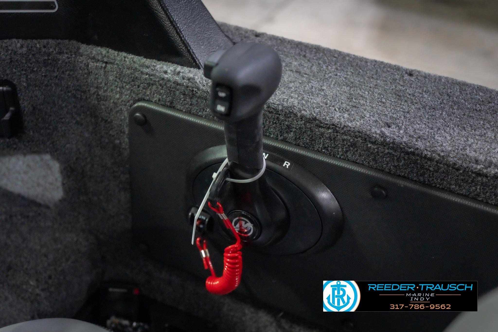 2026 Lund 2075 Impact XS boat throttle control with safety lanyard, Reeder Trausch Marine logo.
