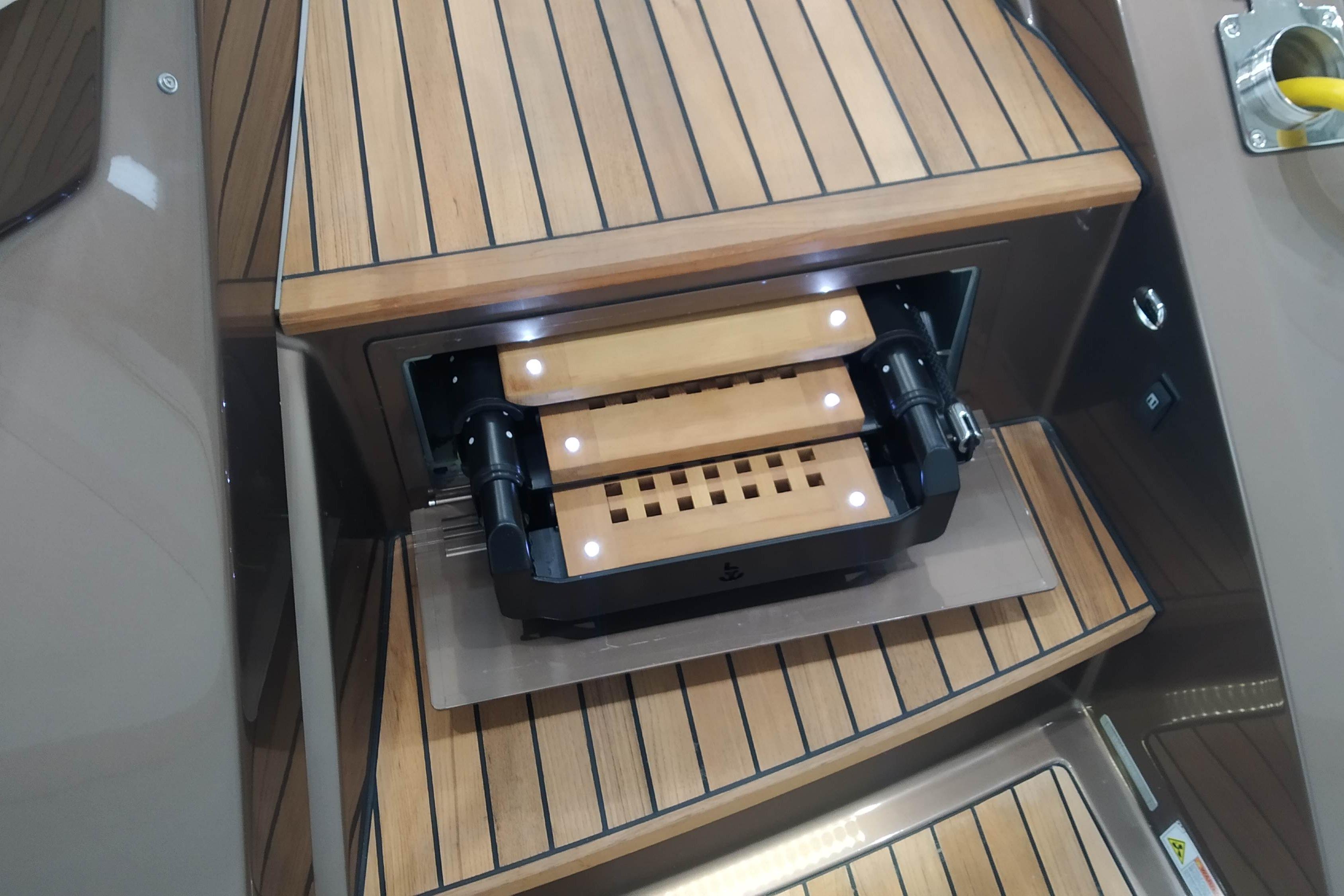2023 Cranchi 60 ST yacht interior with wooden steps and modern design.