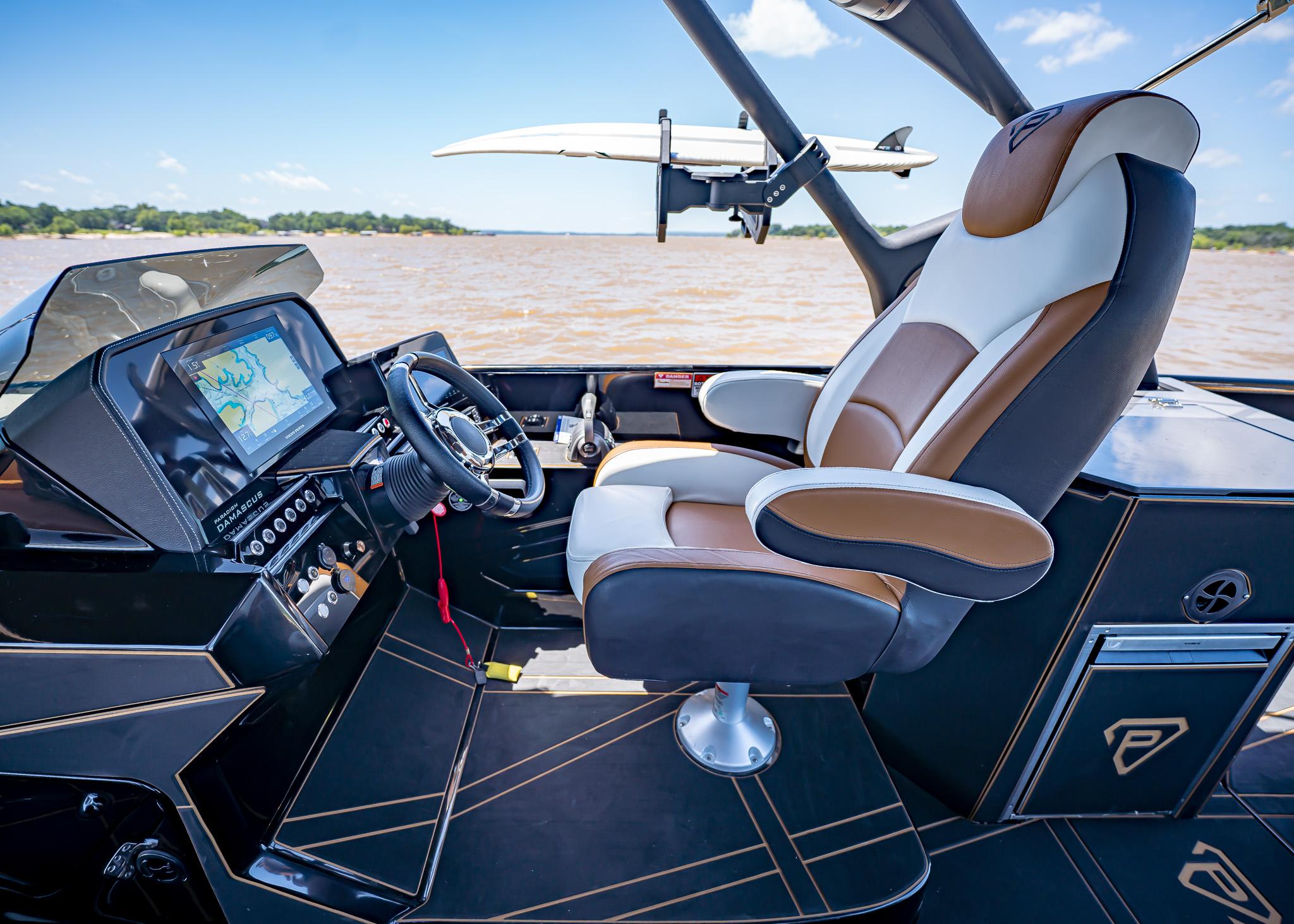 Luxury boat cockpit with advanced navigation system, Paradigm 236 model, 2025.