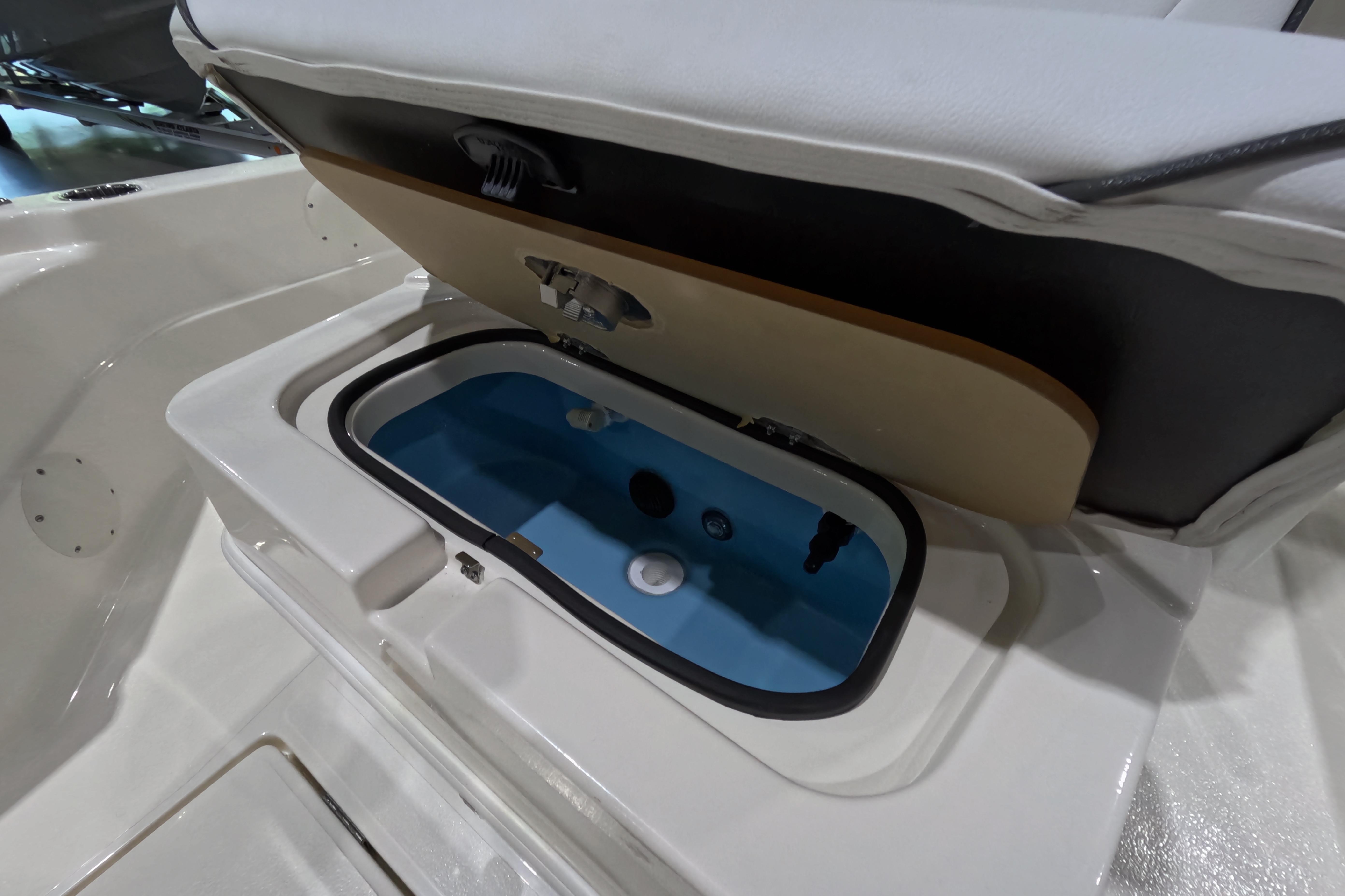 2026 Skeeter boat livewell with open lid, showcasing interior design and functionality.