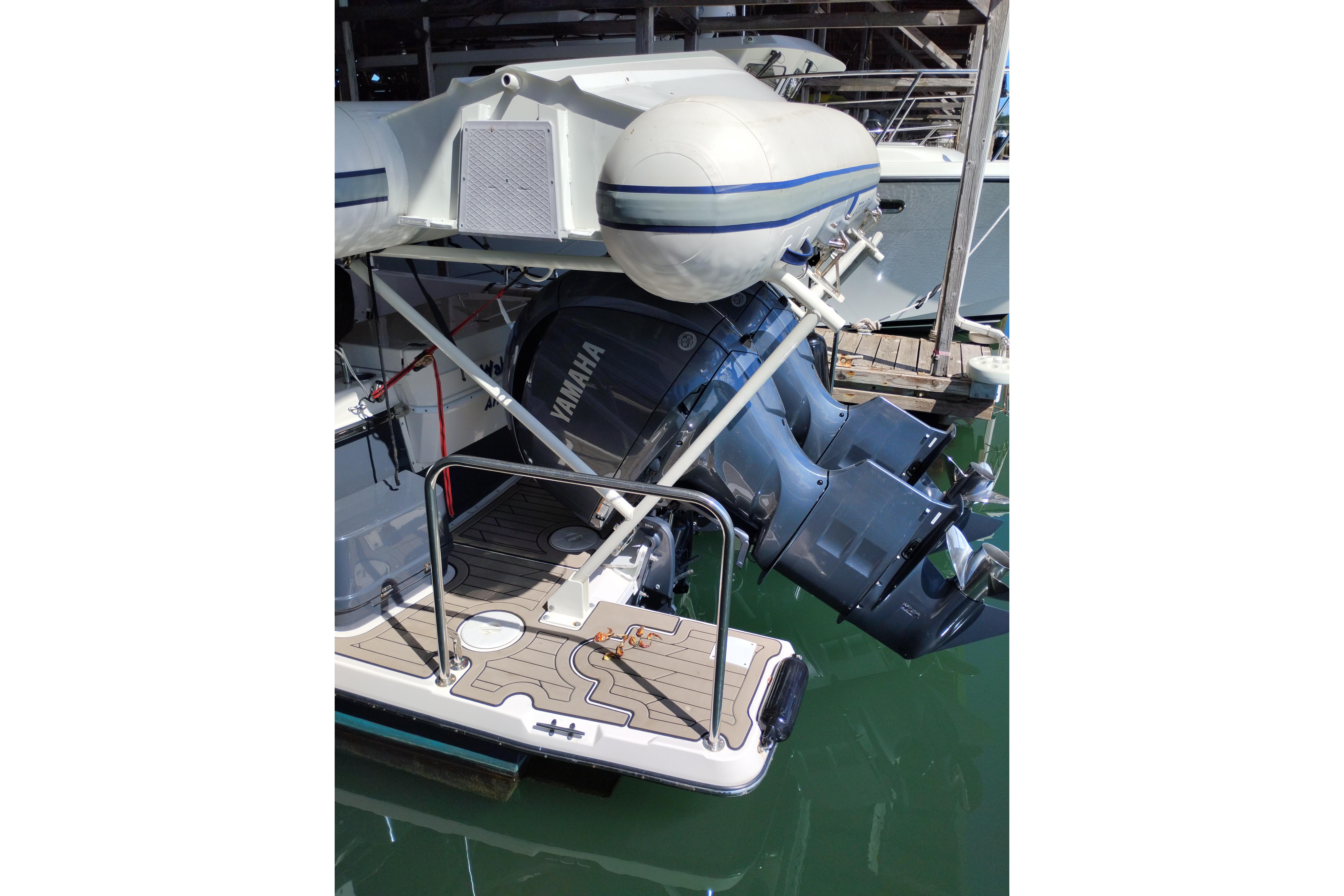 2022 Cutwater C-32 Coupe with Yamaha outboard engines at dock.