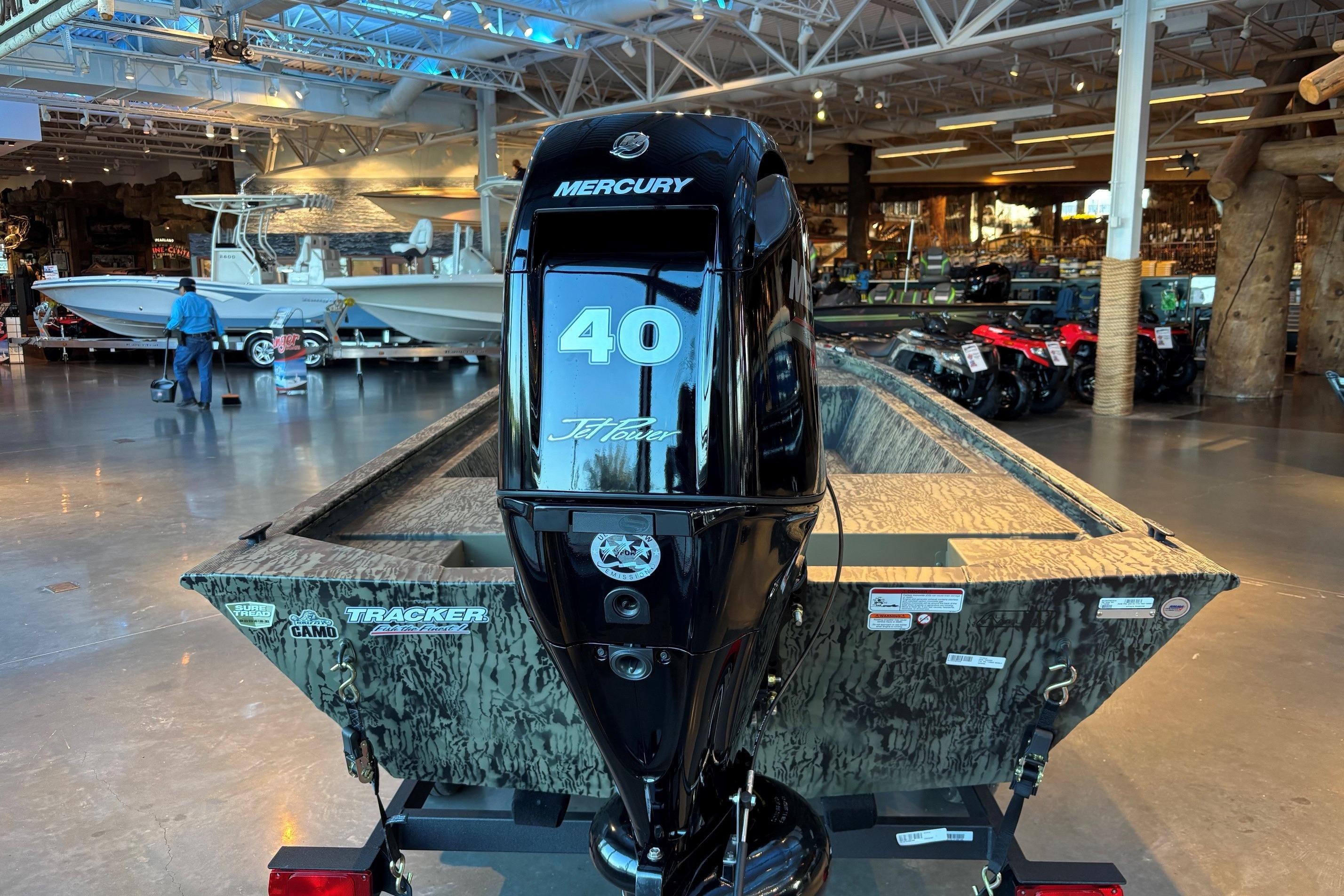 2026 Tracker Grizzly 1648 Utility boat with Mercury 40 Jet motor in showroom.