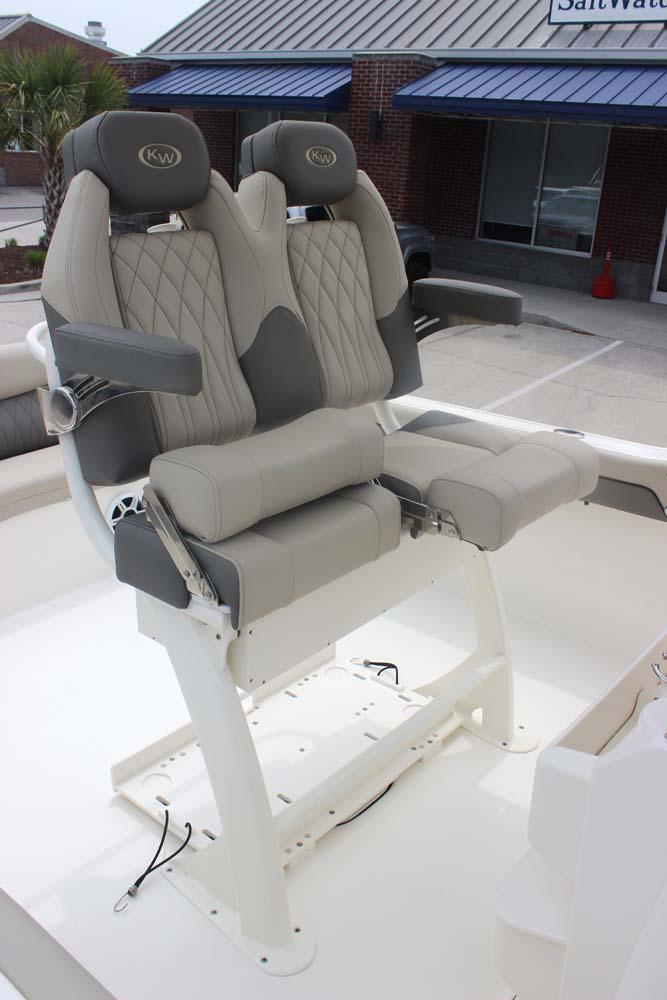 2025 Key West 239 FSR boat seats with armrests and diamond stitching.