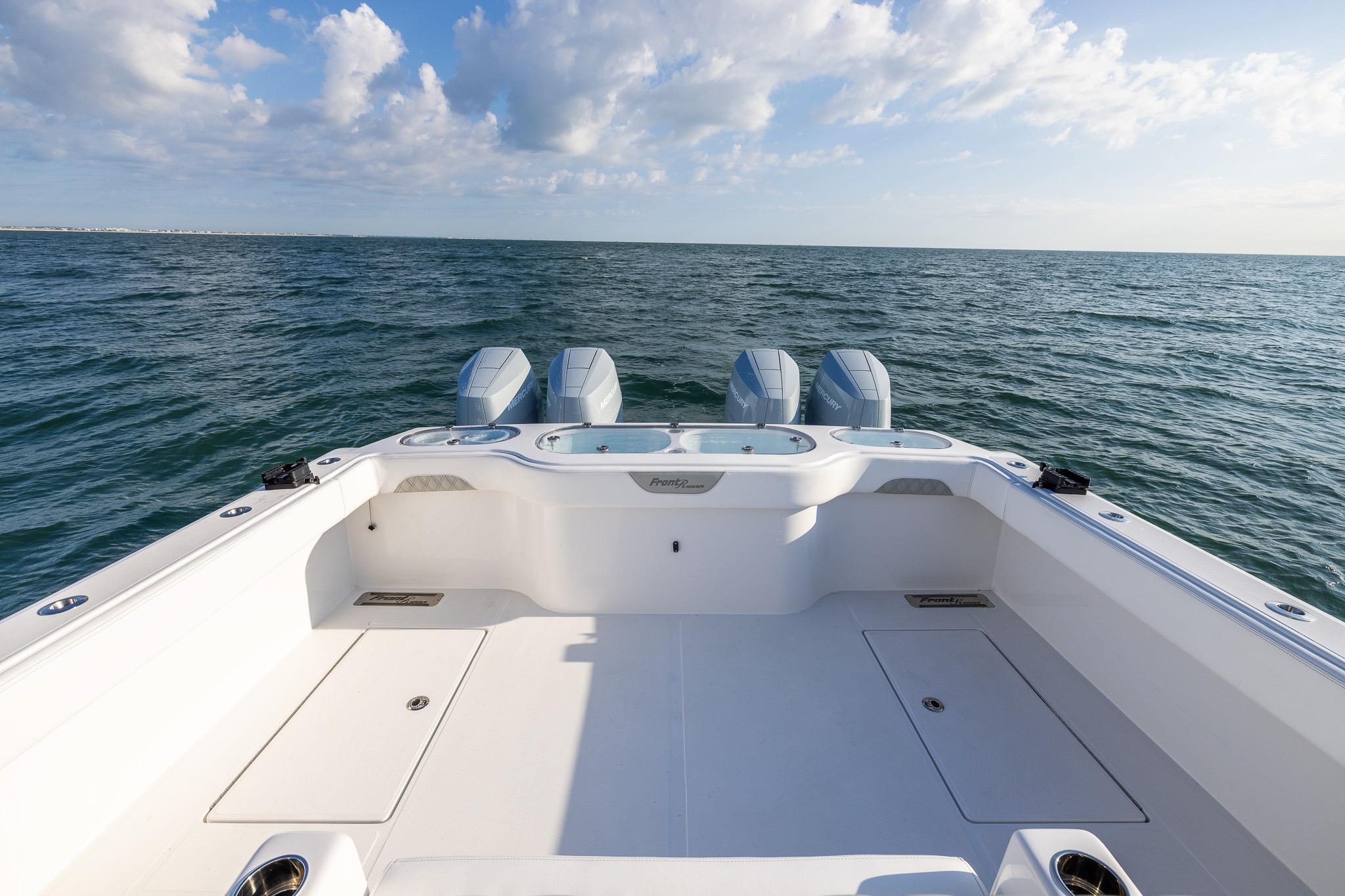 2026 Front Runner 37 Catamaran on open sea, showcasing spacious deck and powerful engines.