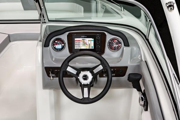 Manufacturer Provided Image: 2022 Chaparral 23 SSi boat dashboard with steering wheel and navigation display.