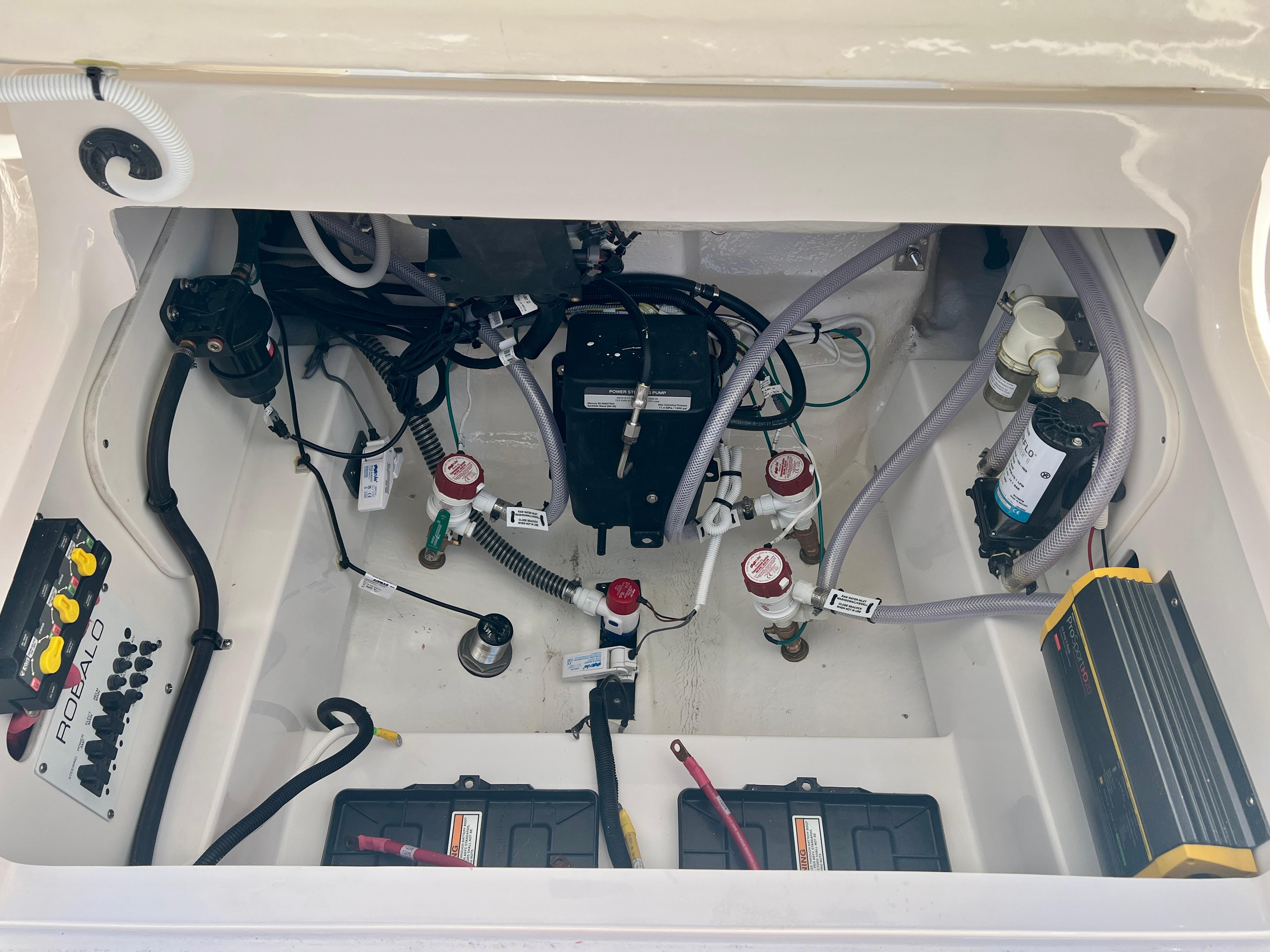 Interior view of a 2025 Robalo 266 Cayman engine compartment.