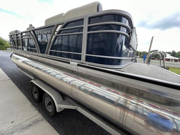 2020 Veranda VP22VLC pontoon boat on trailer, side view.