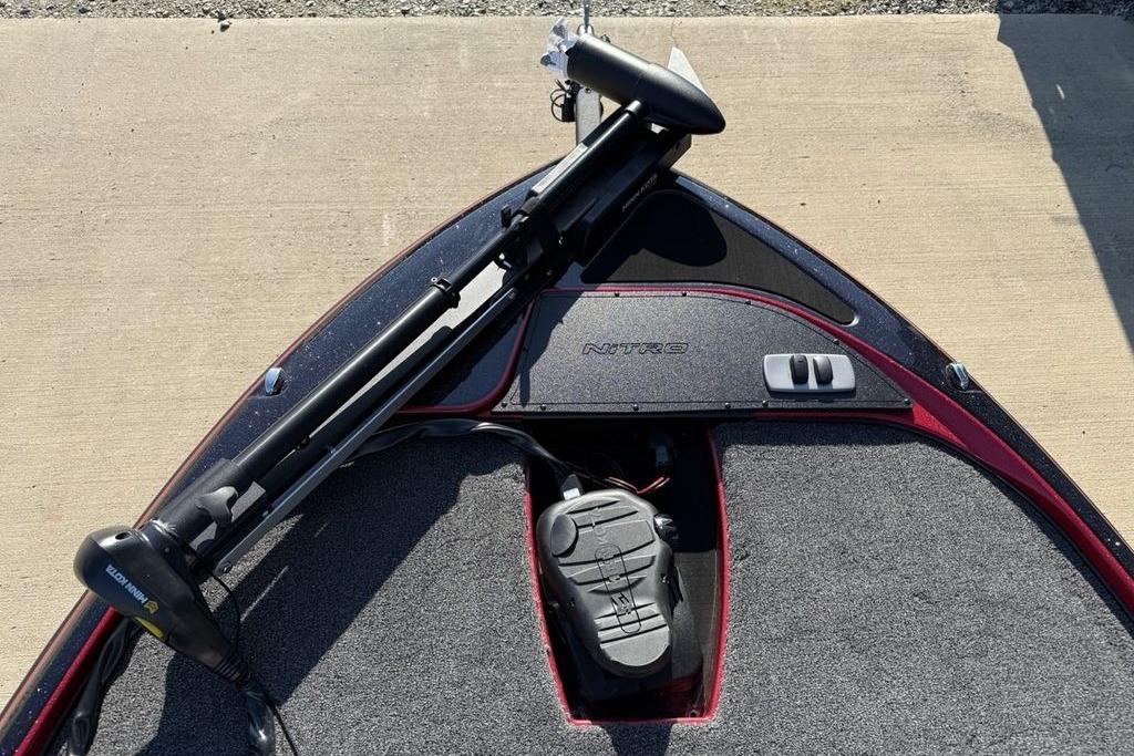 Bow of a 2026 Nitro Z17 boat with trolling motor and storage compartment.