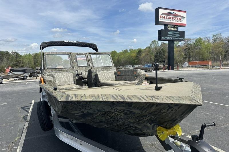 2026 SeaArk EasyCat boat on trailer at Palmetto Boat Center, under clear sky.