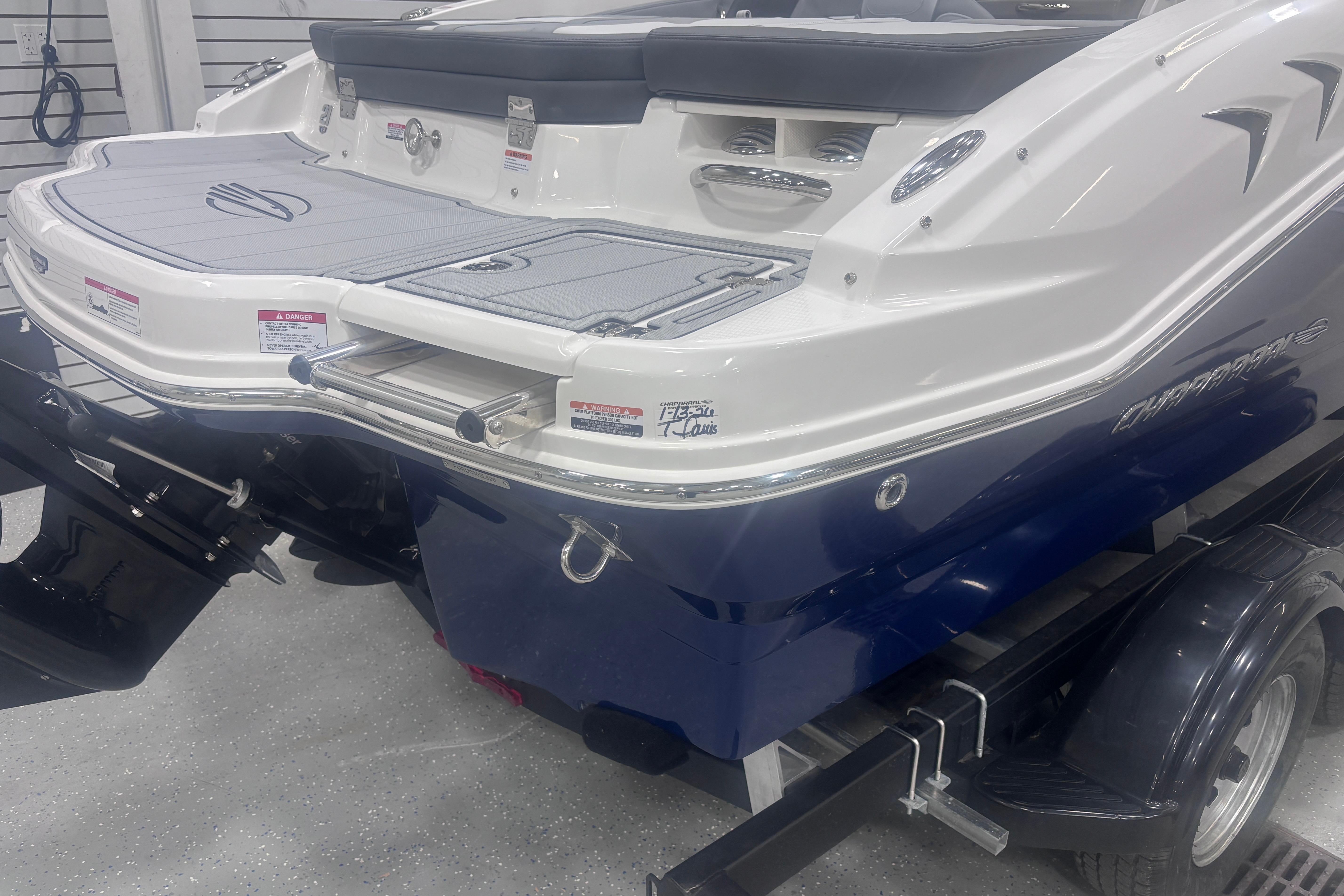 2026 Chaparral 21 SSi boat rear view, featuring sleek design and modern features.