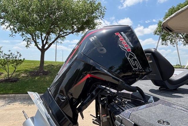 2026 Ranger 212LS boat with Mercury Pro XS engine, parked outdoors under a clear sky.