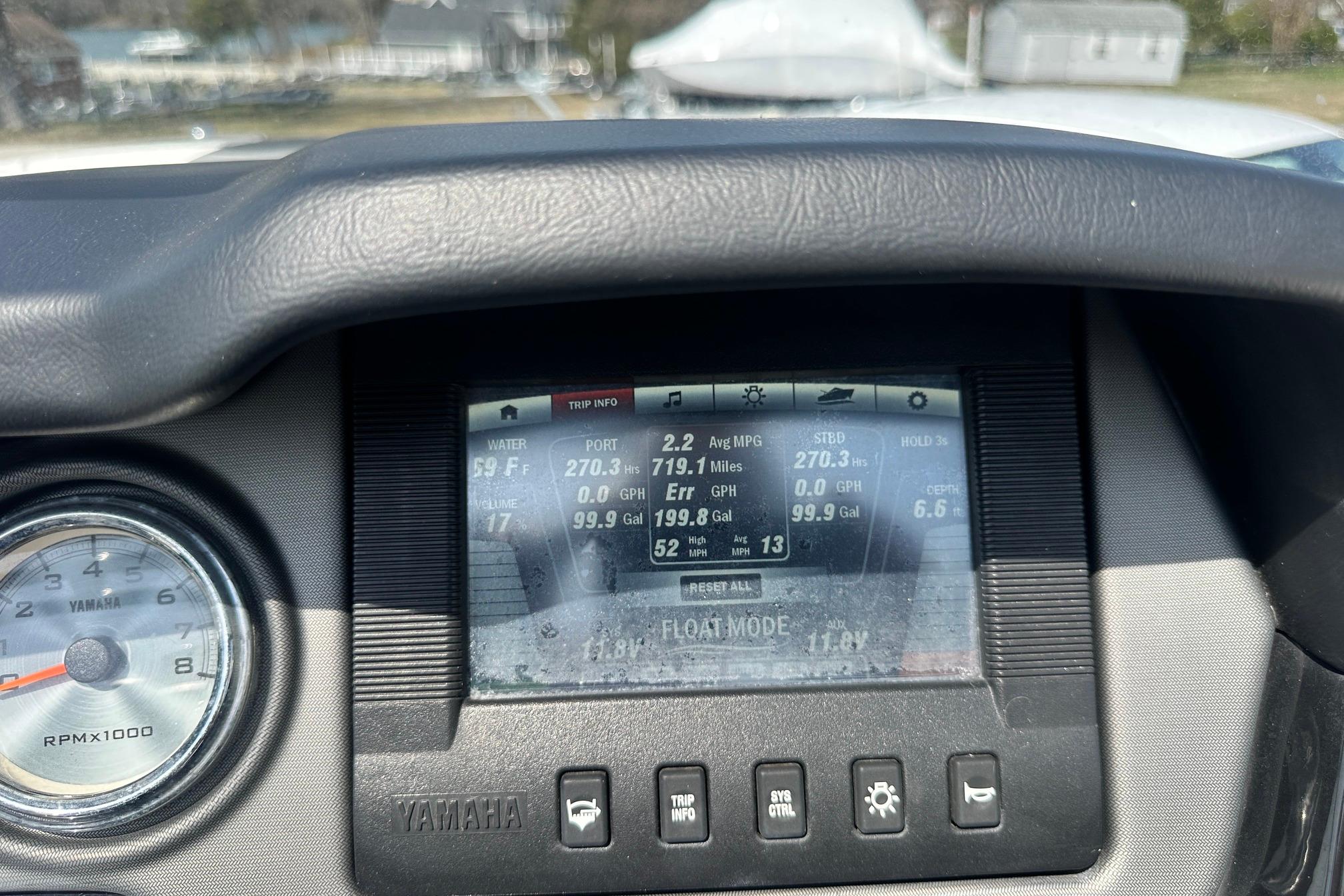 Dashboard of a 2016 Yamaha 242 Limited S boat displaying trip information.