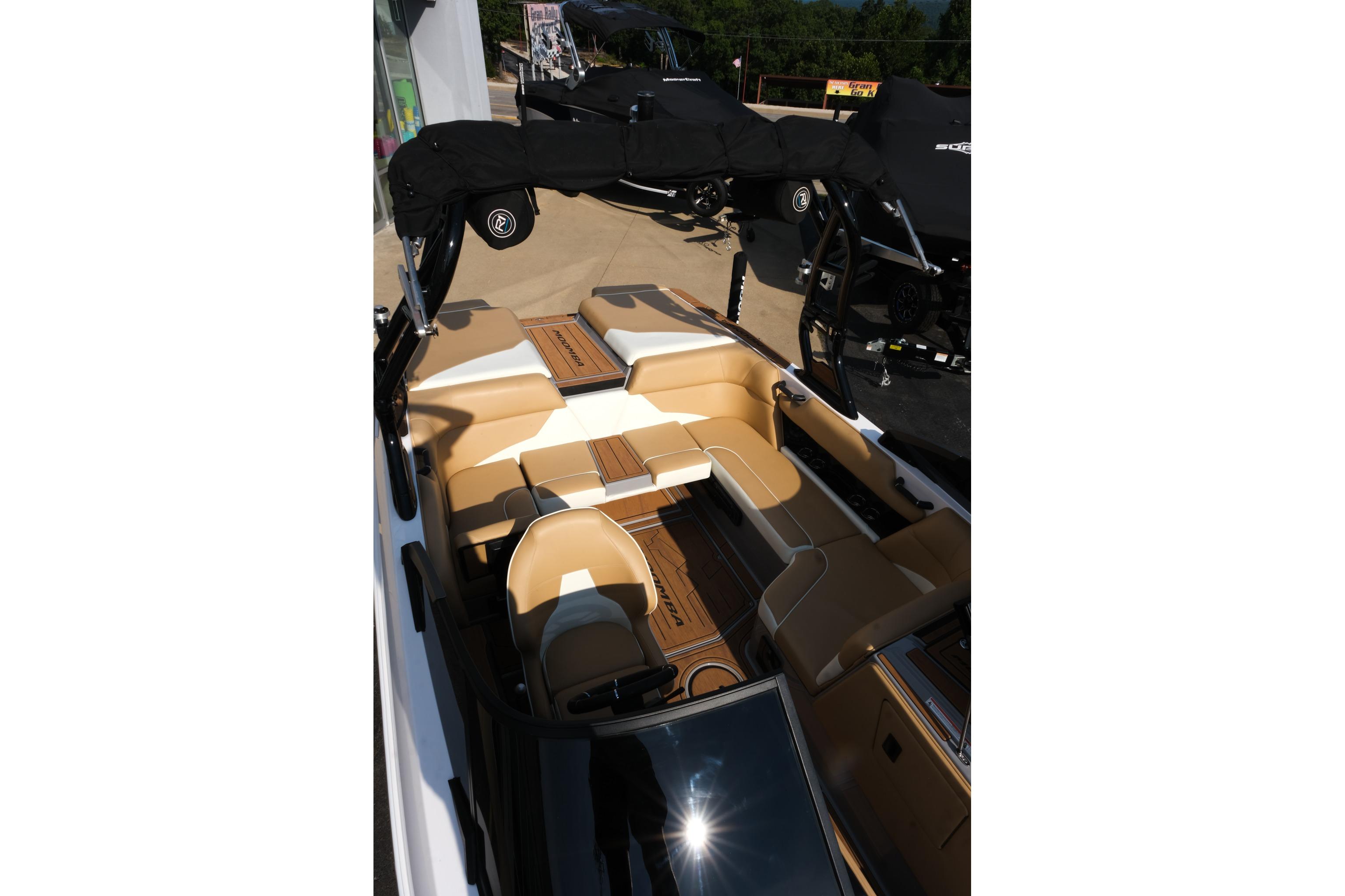2023 Moomba Mondo boat interior with tan seating and sleek design.