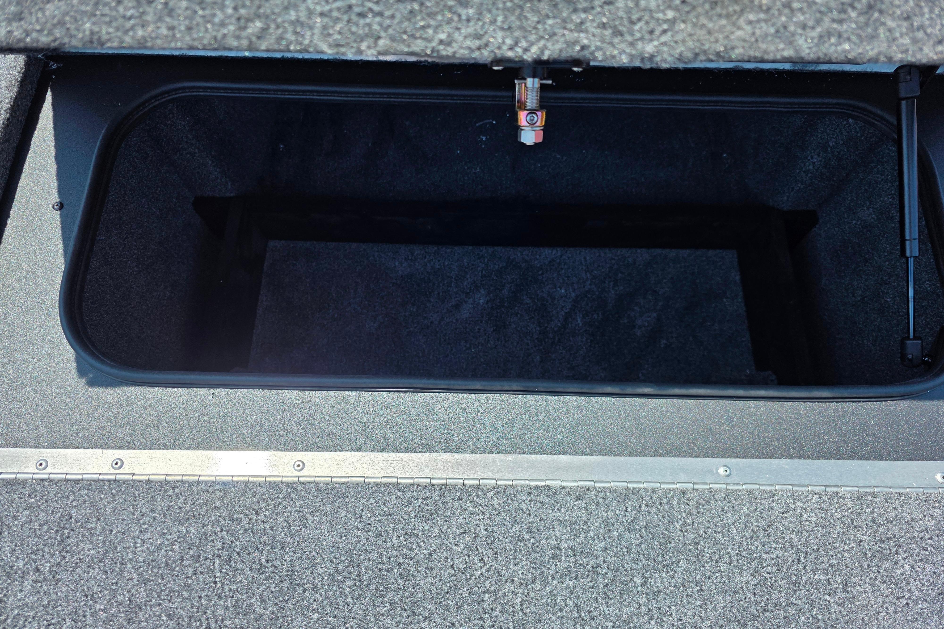 Open storage compartment in 2026 Tracker Pro Team 195 boat.