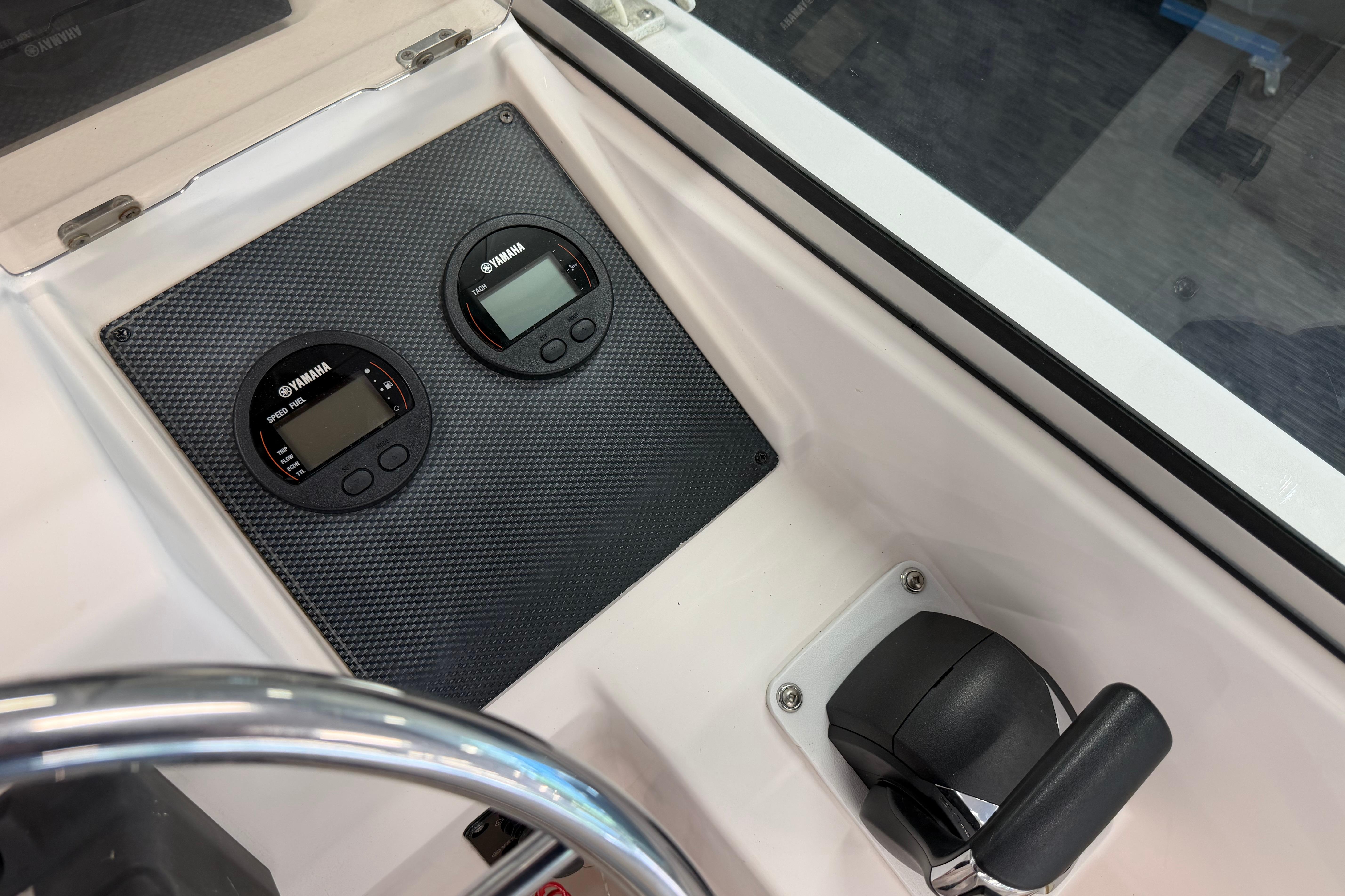 2001 Grady-White Tournament 223 dashboard with Yamaha gauges and controls.