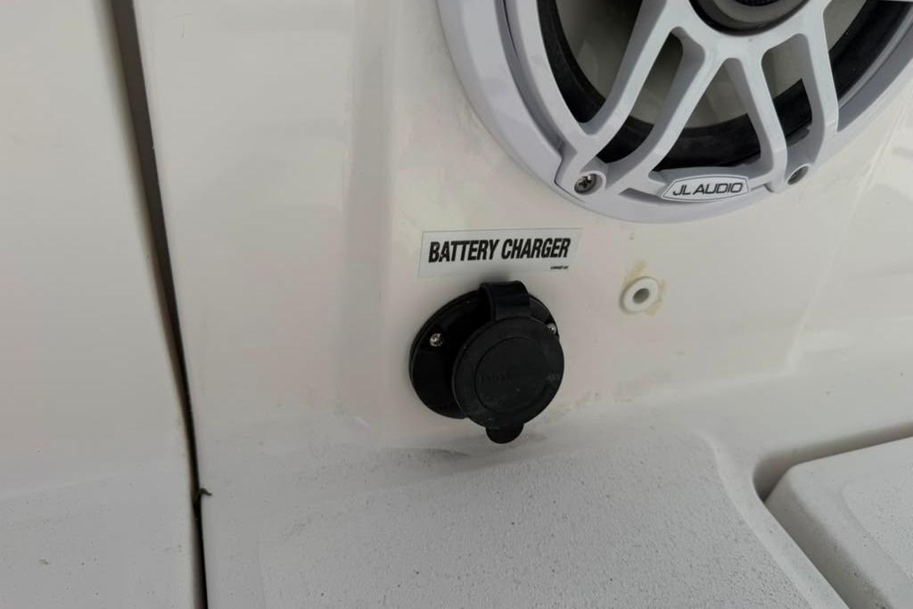 Battery charger port on 2026 Sea Fox 288 Traveler boat with JL Audio speaker.