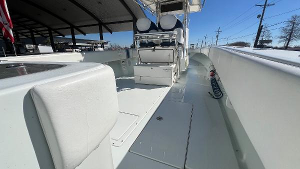 2005 Contender 36 Open boat interior with seating and storage compartments.