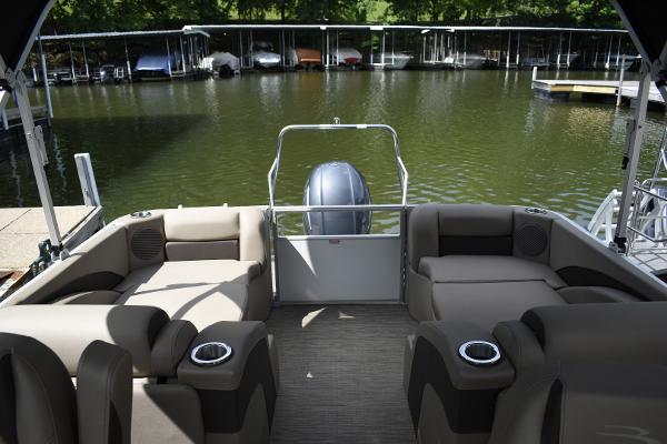 2023 Bennington 22 SXCW pontoon boat interior with comfortable seating and cup holders.