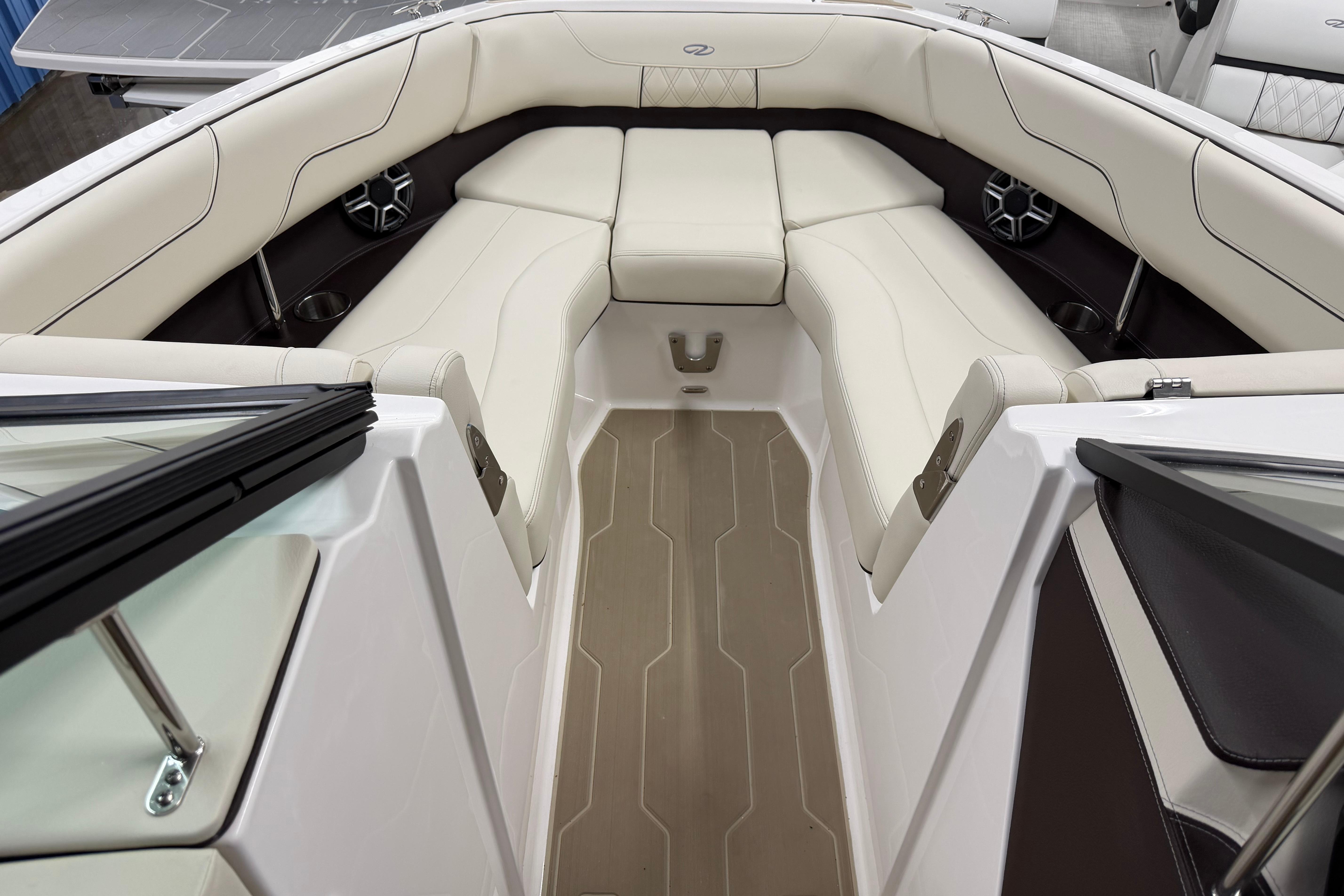 2026 Regal LS6 boat interior with luxurious beige seating and modern design.