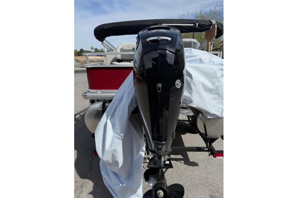 2026 Sun Tracker Bass Buggy 18 DLX with Mercury outboard motor, rear view.