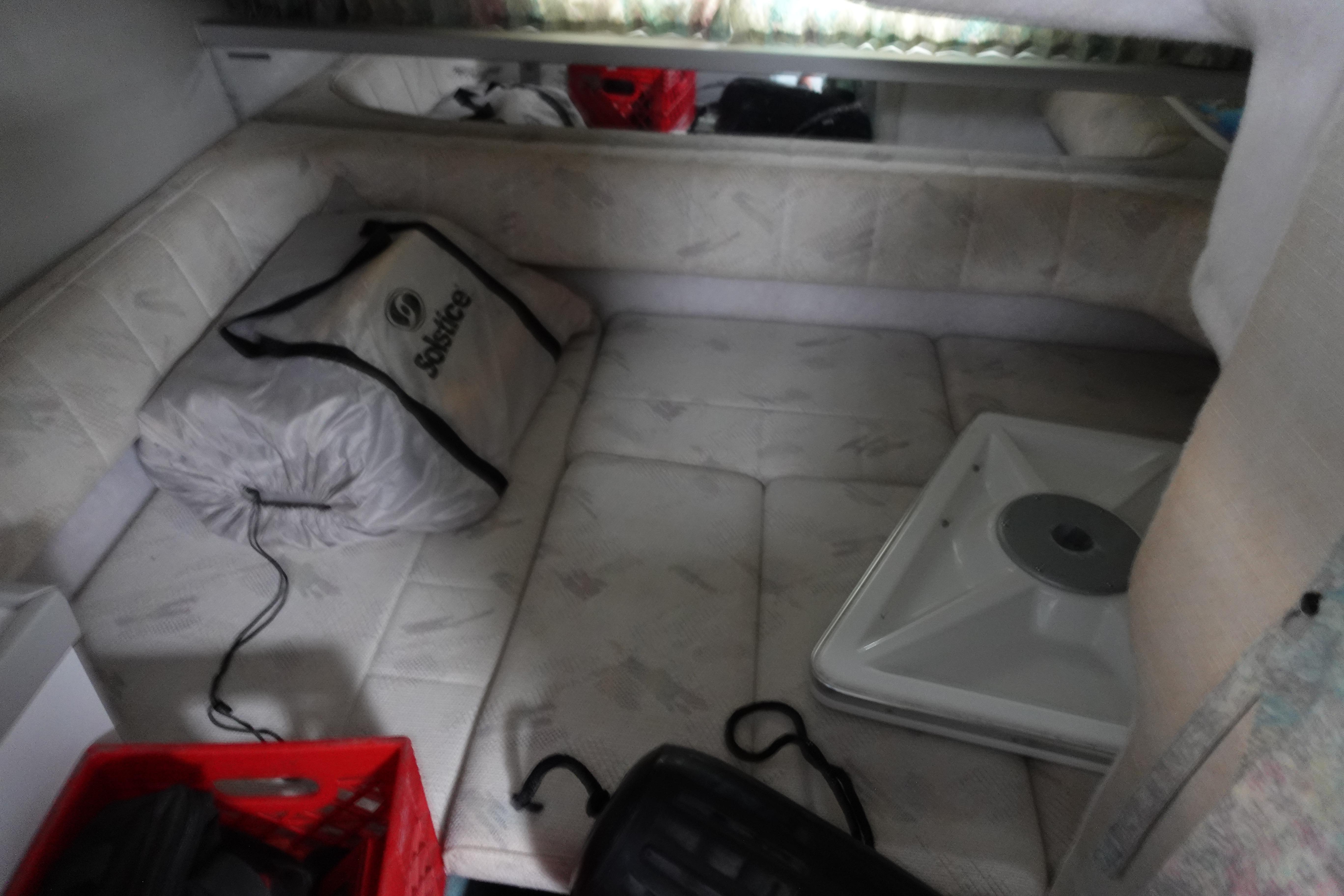 Interior of 1993 Formula 34 Performance Cruiser with seating and storage items.
