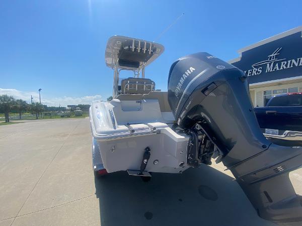 2024 Key West 239 FS boat with Yamaha outboard motor at a marina.