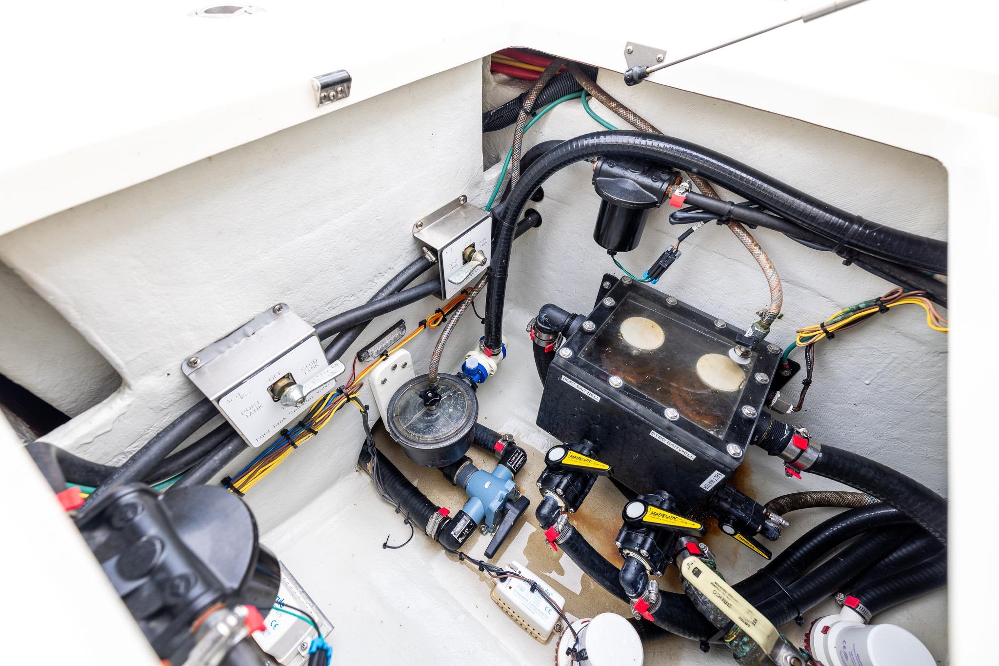 2019 SeaVee 322Z boat wiring and plumbing system in the engine compartment.