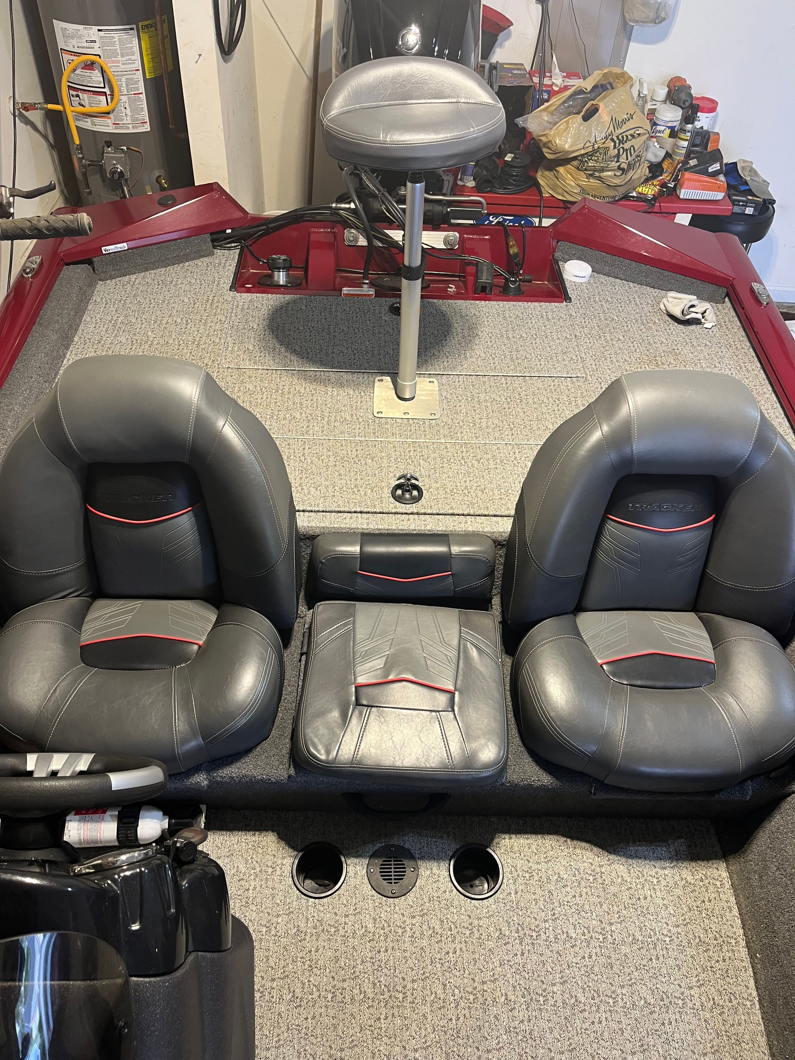 The image shows the cockpit of a 2022 Bass Tracker PRO 175 TEAM TXW TOURNAMENT ED with gray seats.