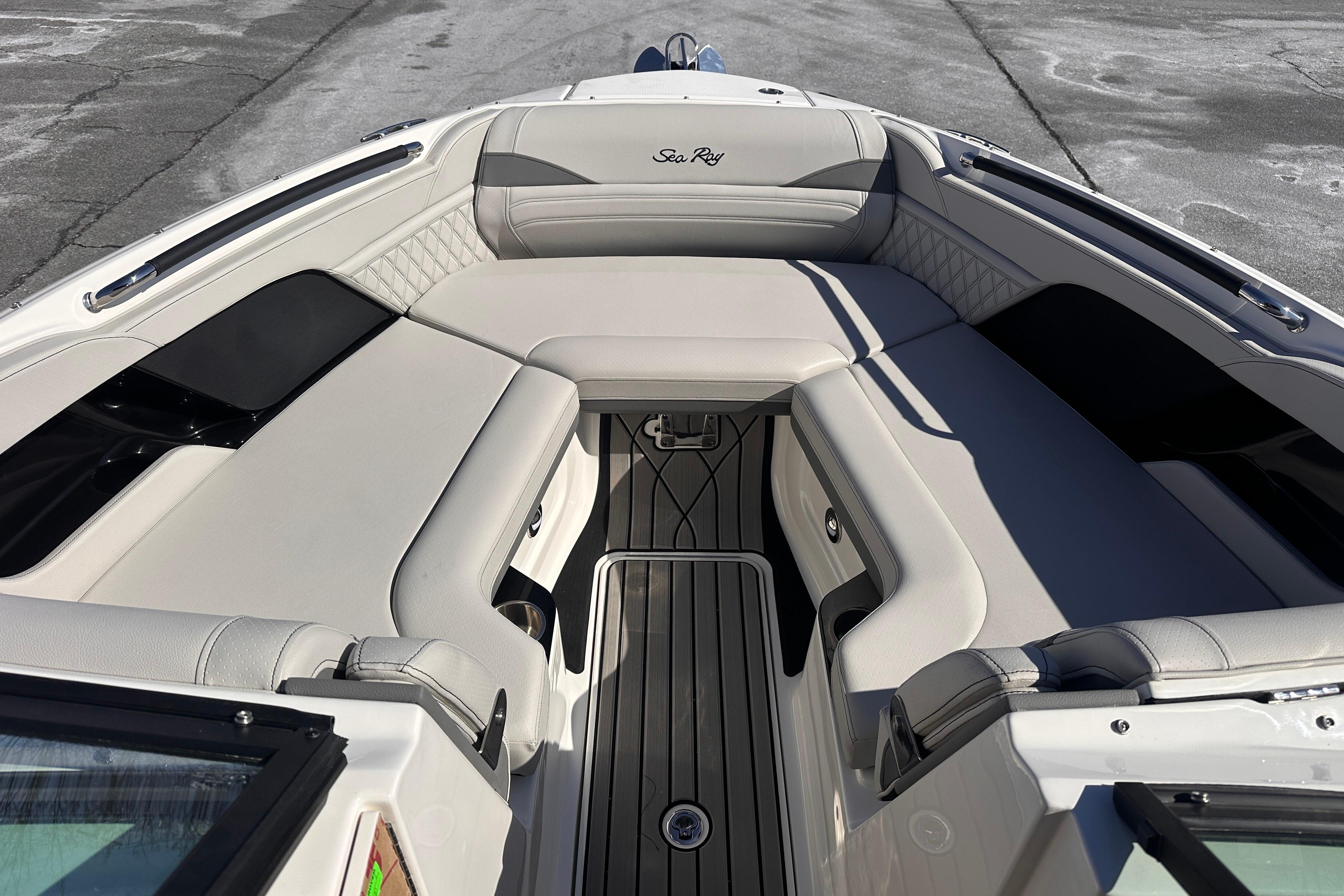 2026 Sea Ray SLX 260 Outboard boat interior with luxurious seating and sleek design.