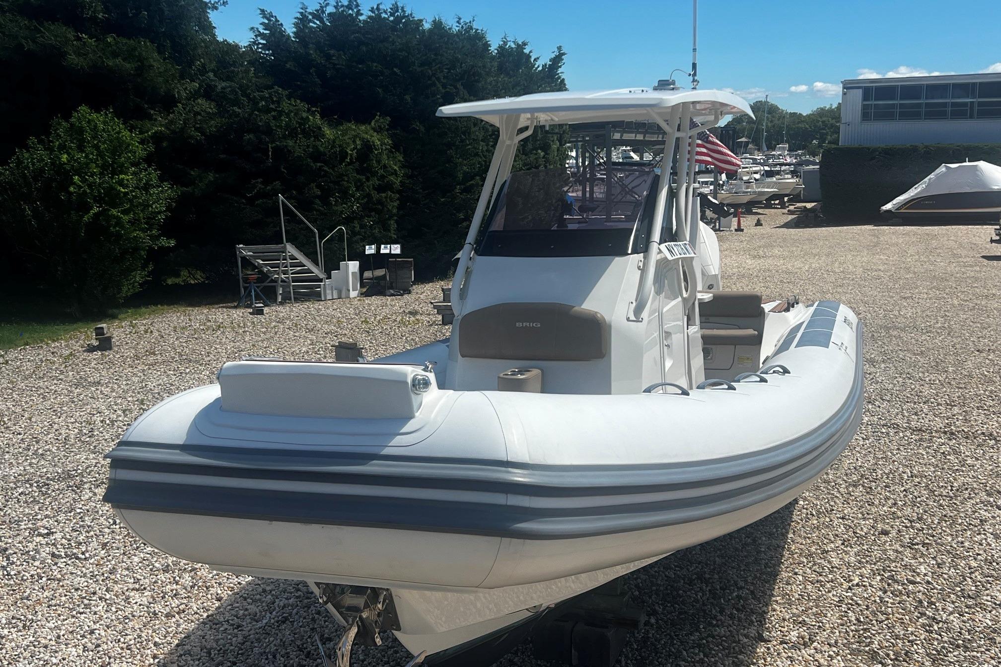 2022 Brig Eagle 8 boat on gravel, featuring sleek design and modern amenities.