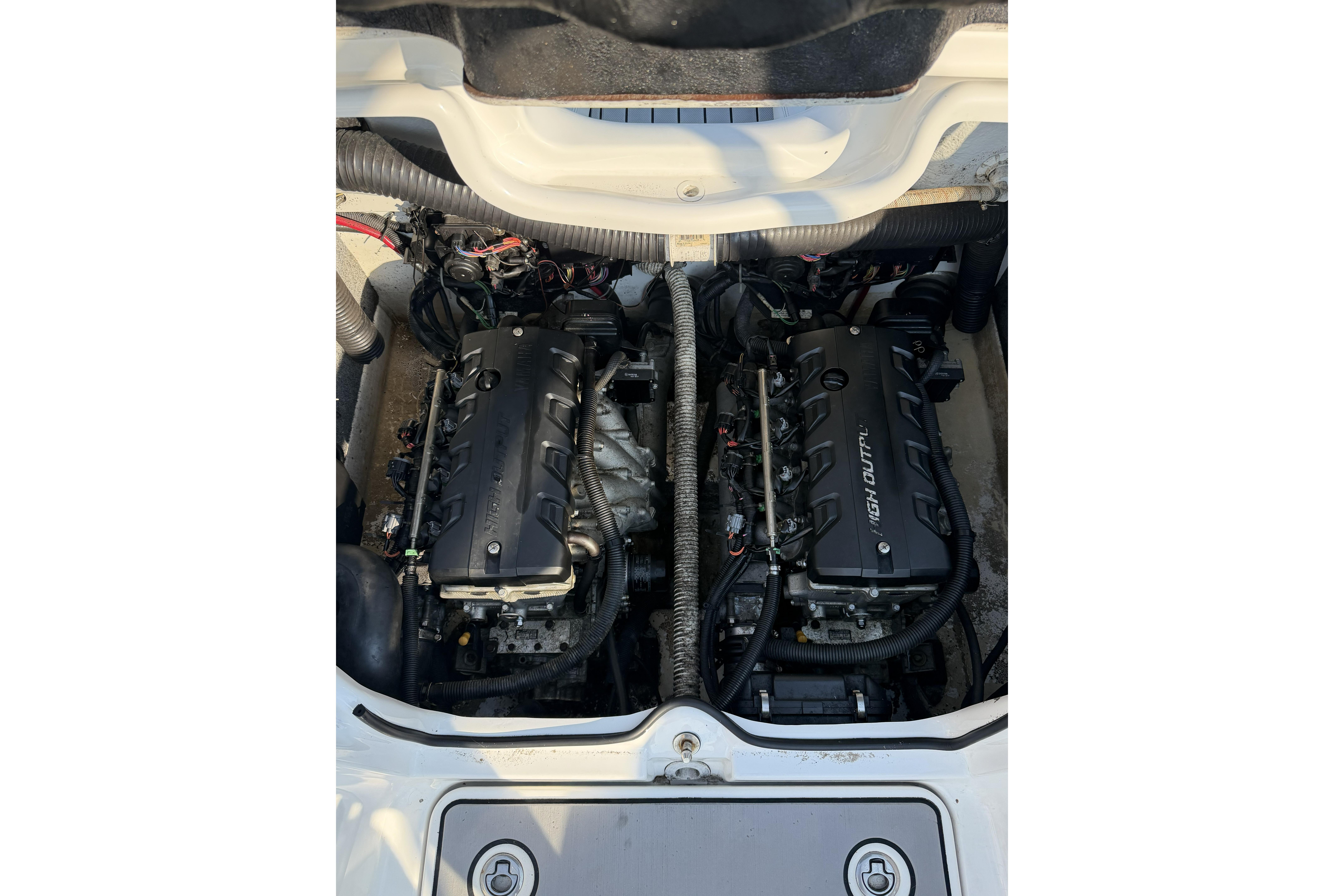 2011 Yamaha Boats AR240 HO engine compartment with dual high-output engines.