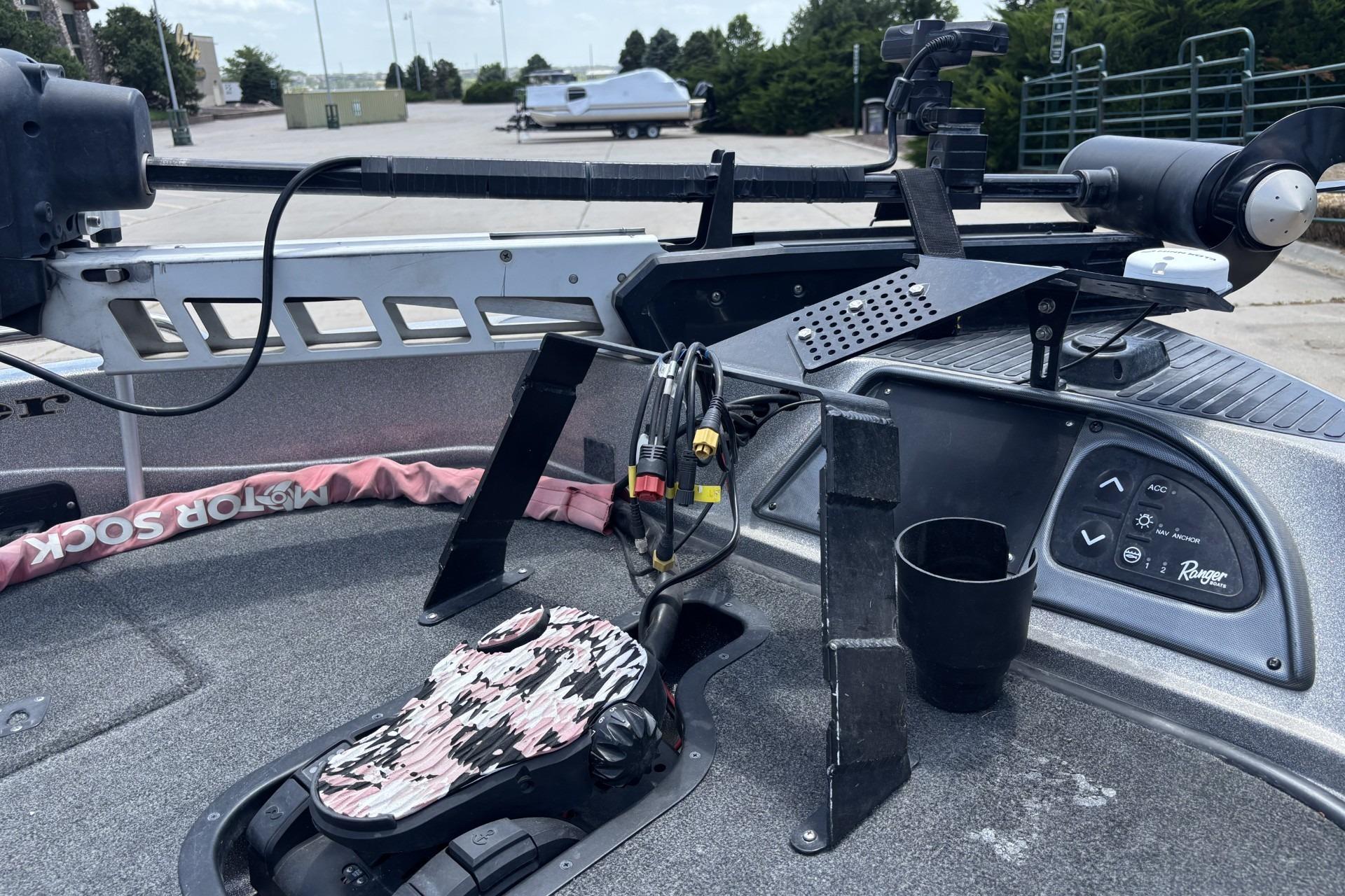 2011 Ranger 620 VS boat dashboard with fishing equipment and control panel.