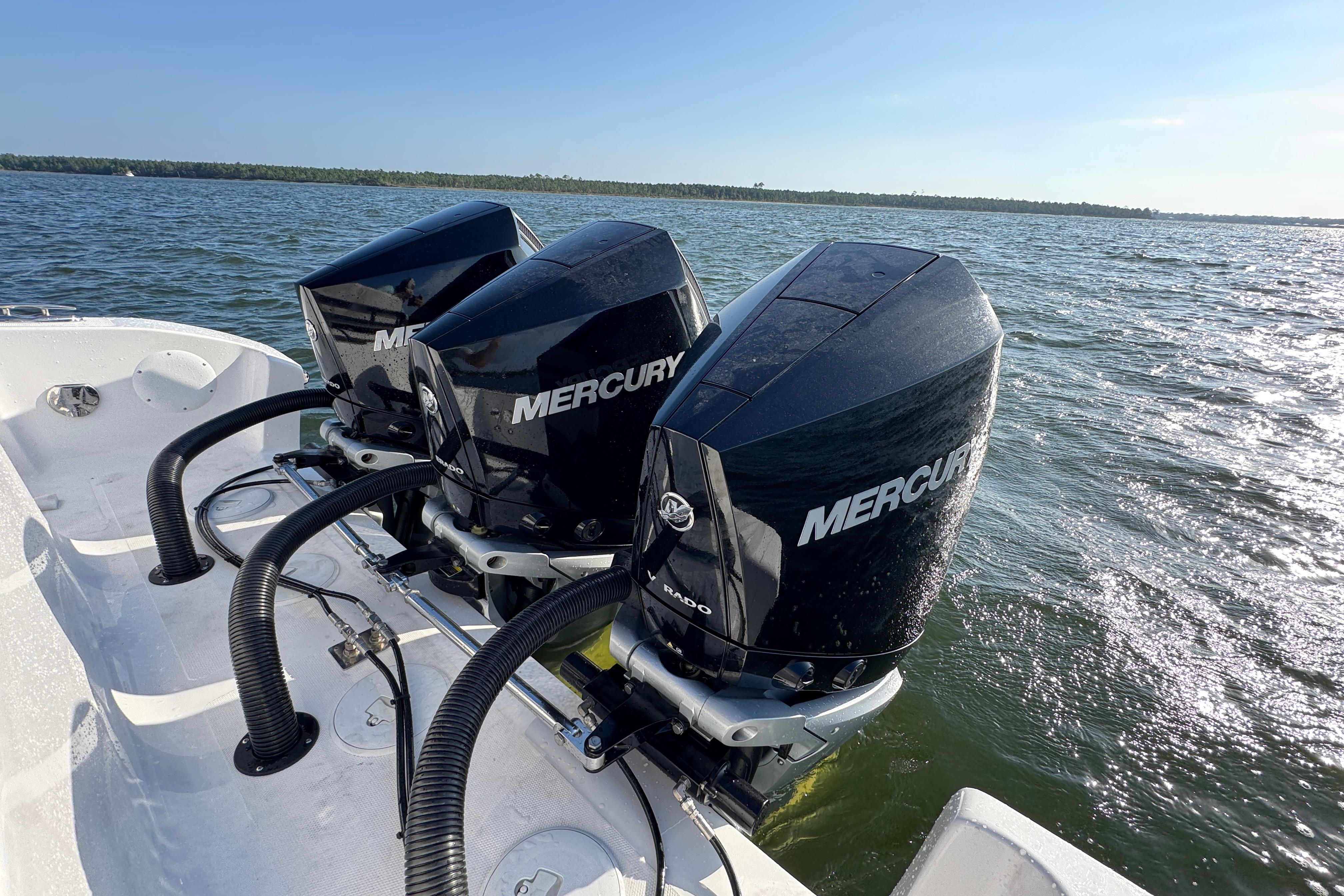 Triple Mercury outboard engines on a 2026 Fountain 34 Tournament Edition boat.