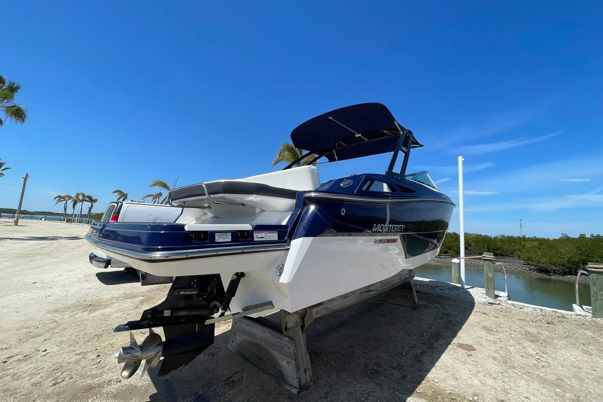 2015 Monterey 268SS Super Sport boat on a sunny day by the water.