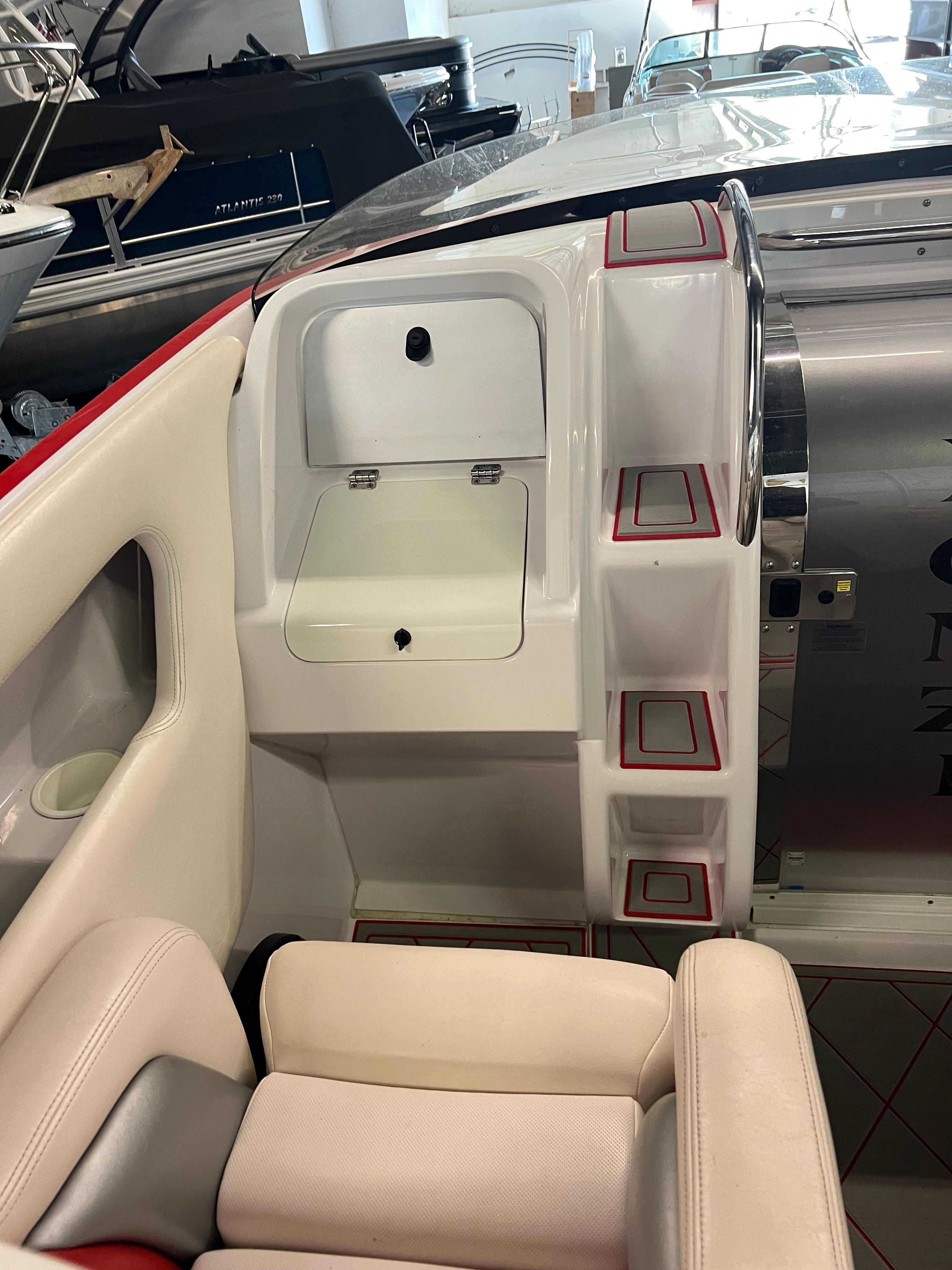 Interior of a 2006 Donzi 38 ZR boat with white seating.