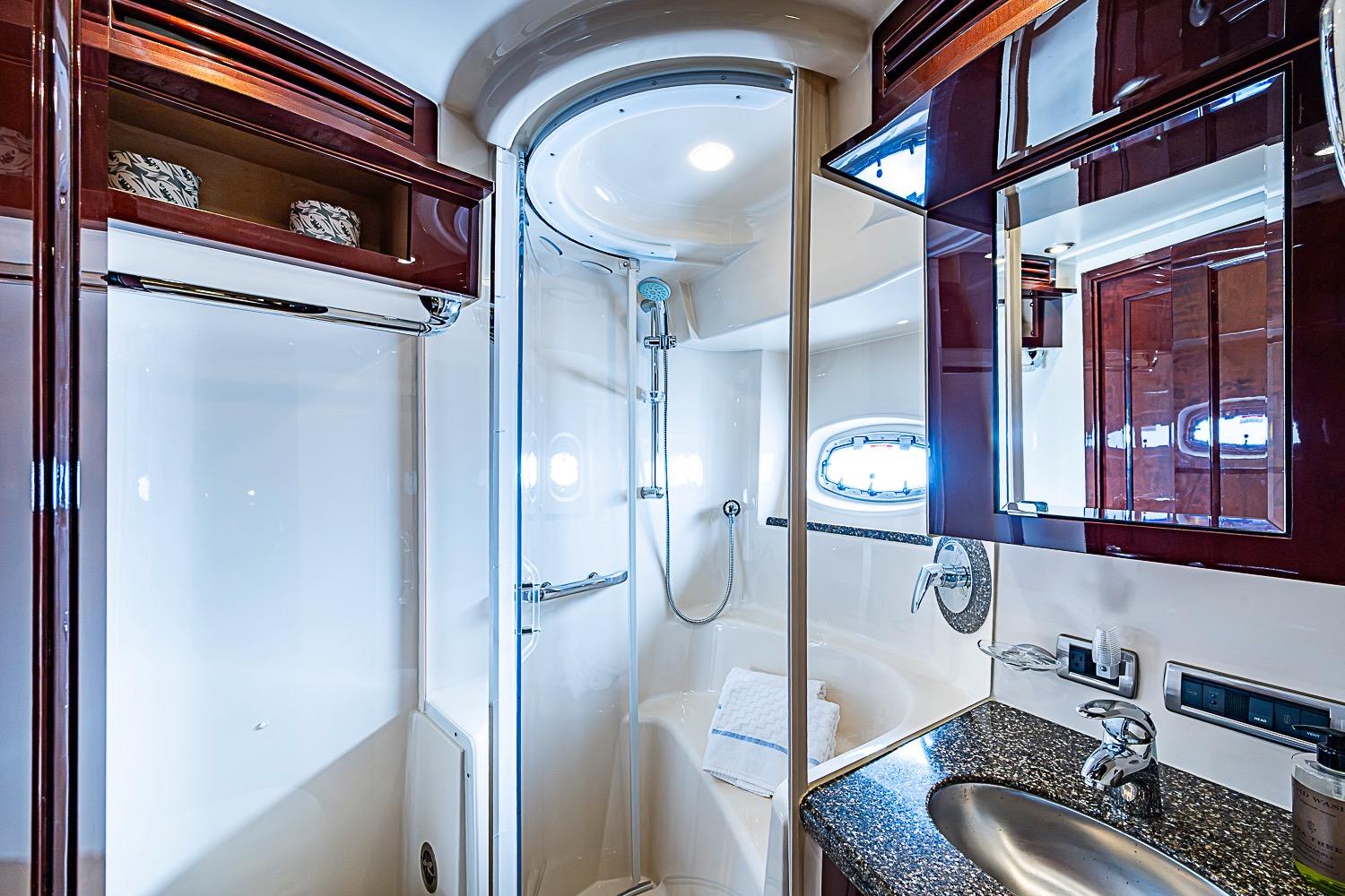 Luxurious bathroom interior of 2008 Sea Ray 60 Sundancer yacht with modern amenities.