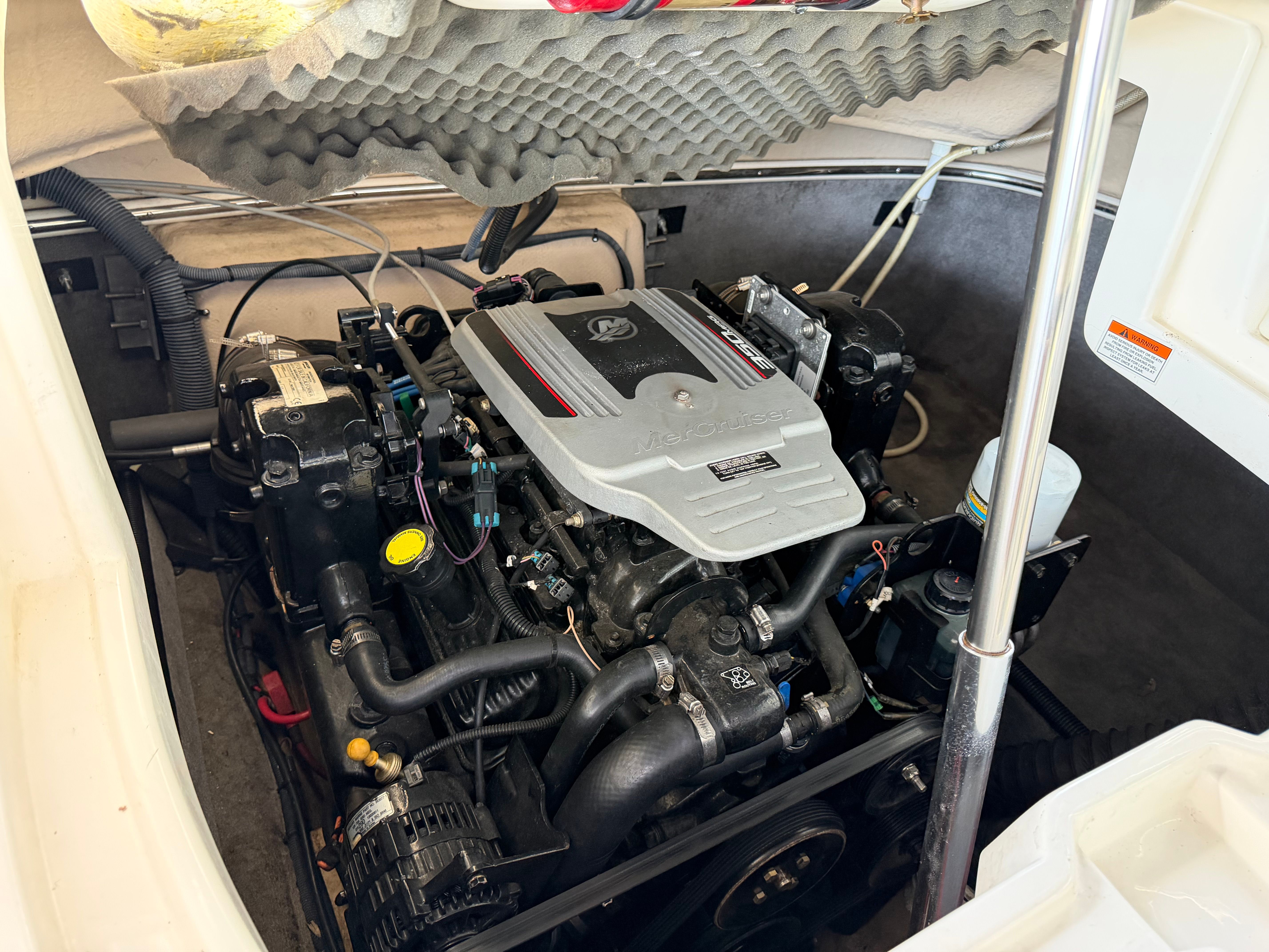 Engine compartment of a 2010 Bryant 255 boat.