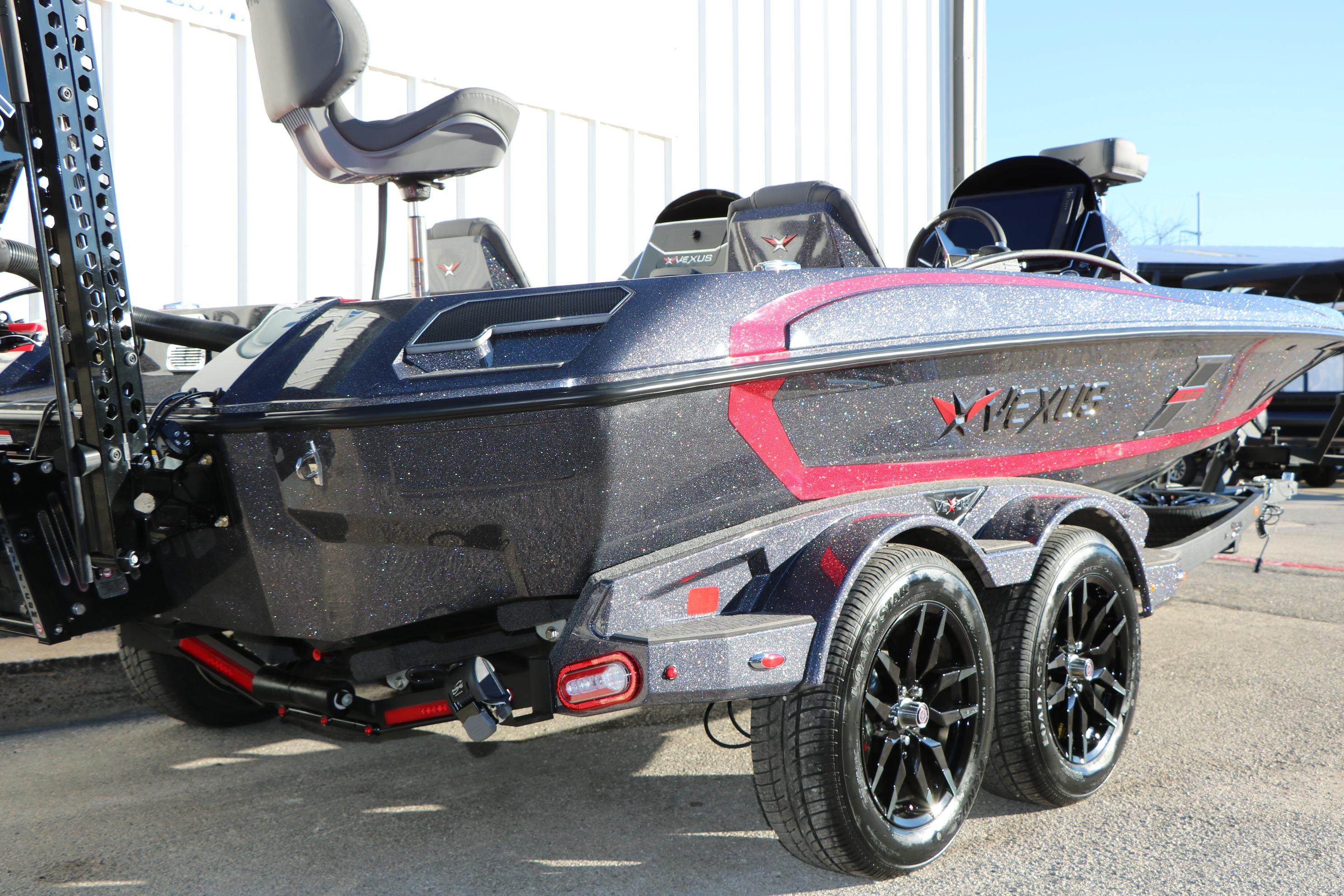 2026 Vexus VXs21 boat with sleek design and dual-axle trailer.
