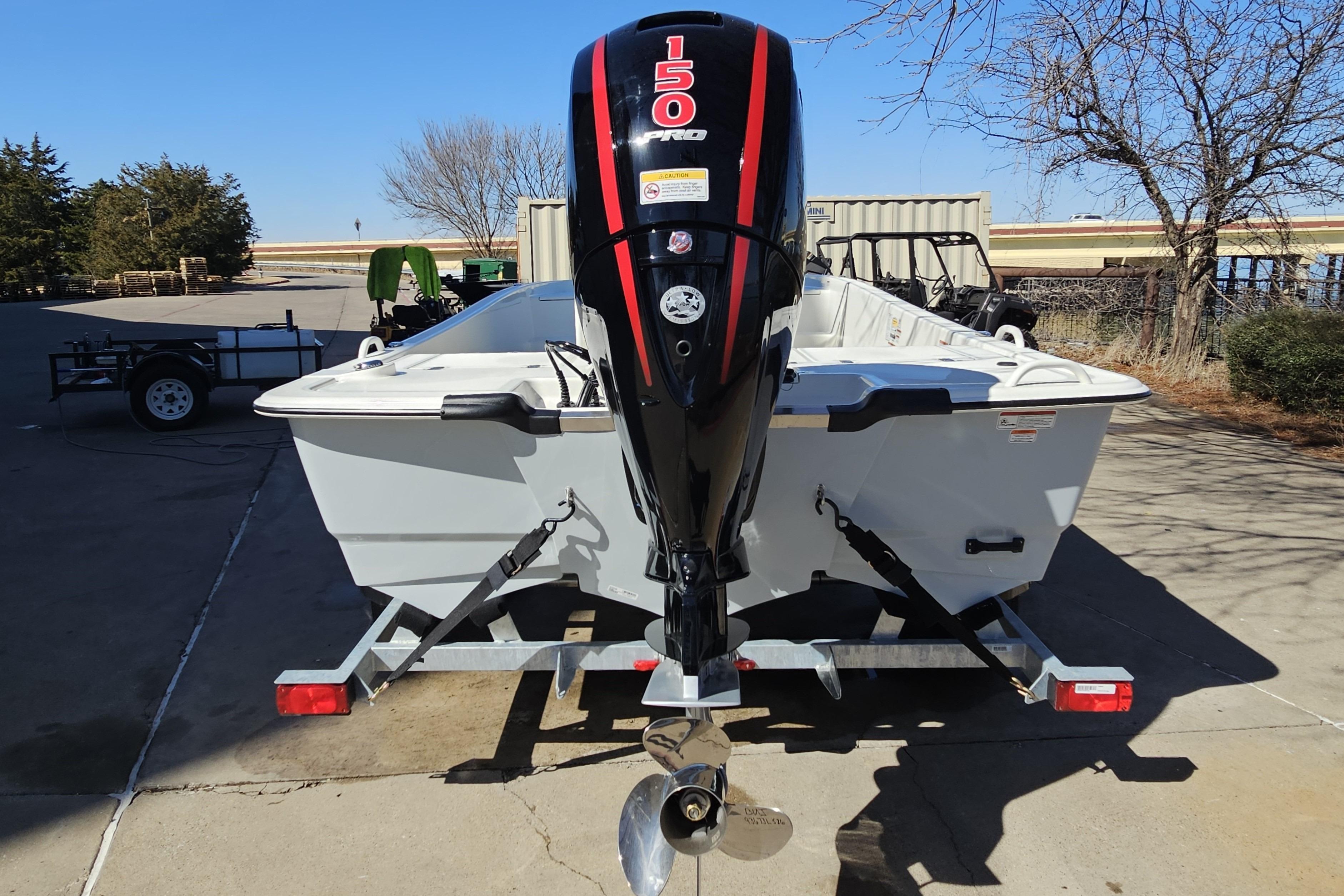 2026 Mako Pro Skiff 19 CC with 150 HP engine on trailer.