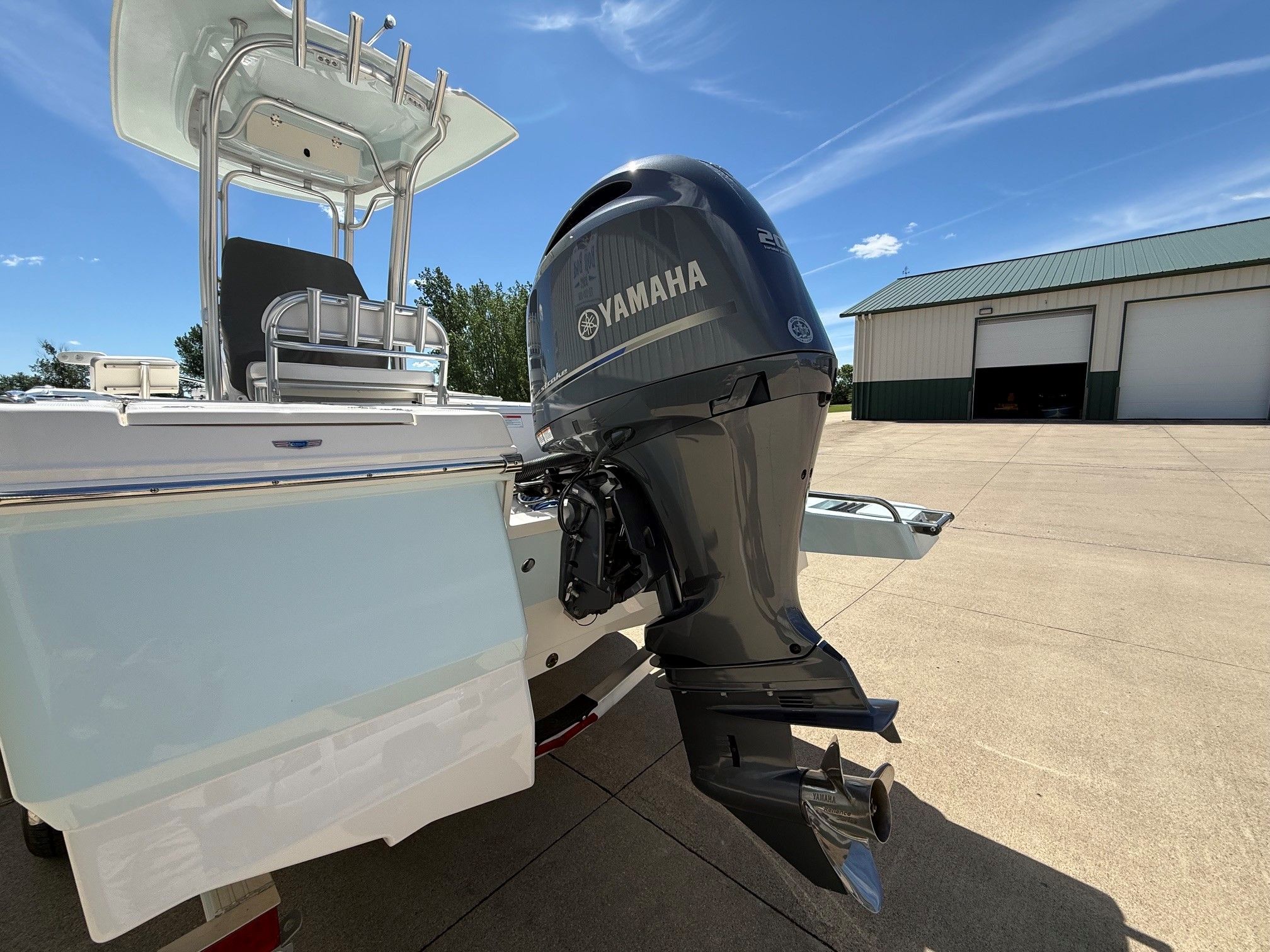 2021 Robalo 226 Cayman with Yamaha outboard motor on concrete surface.