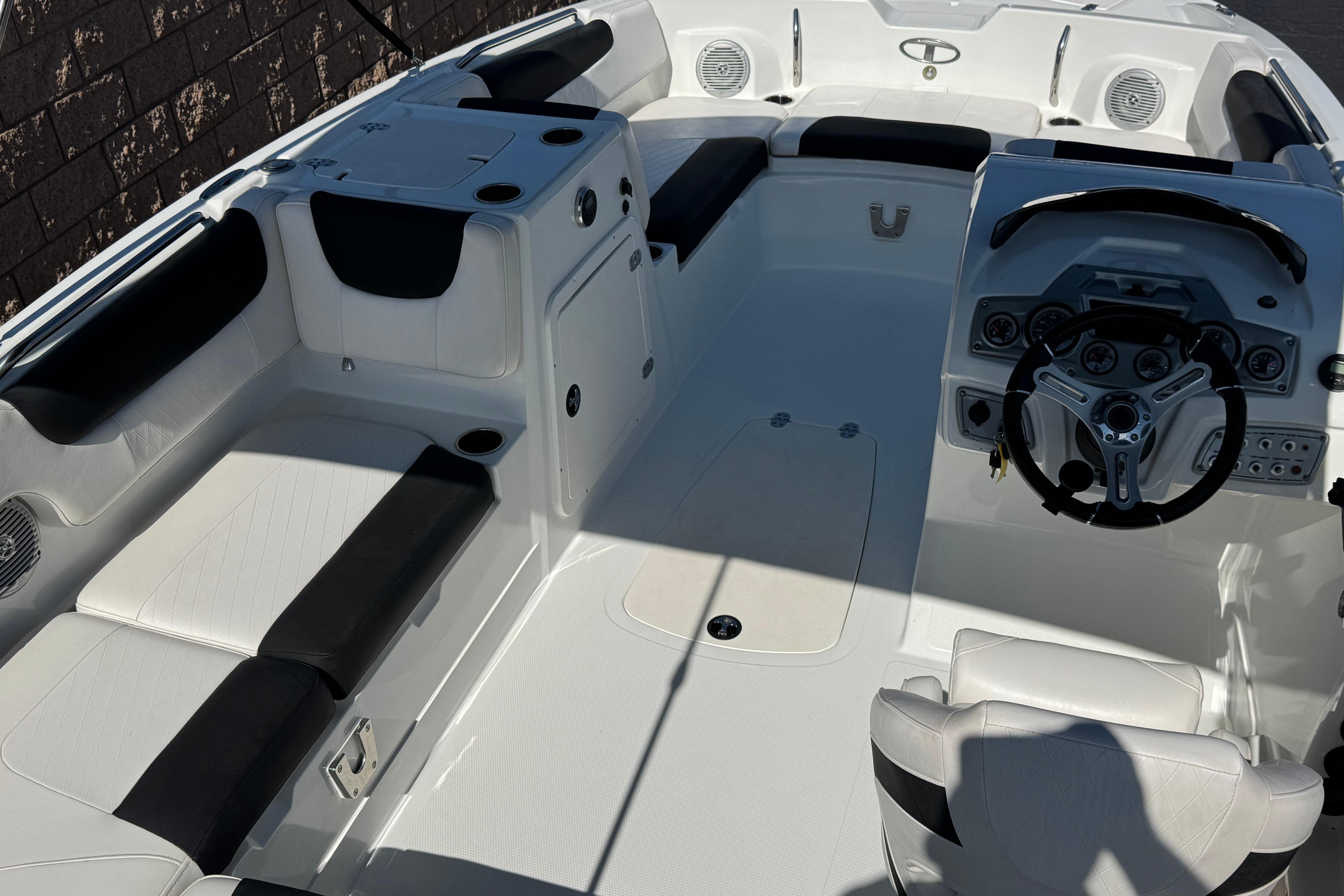 2019 Tahoe 2150 boat interior with sleek seating and modern dashboard design.
