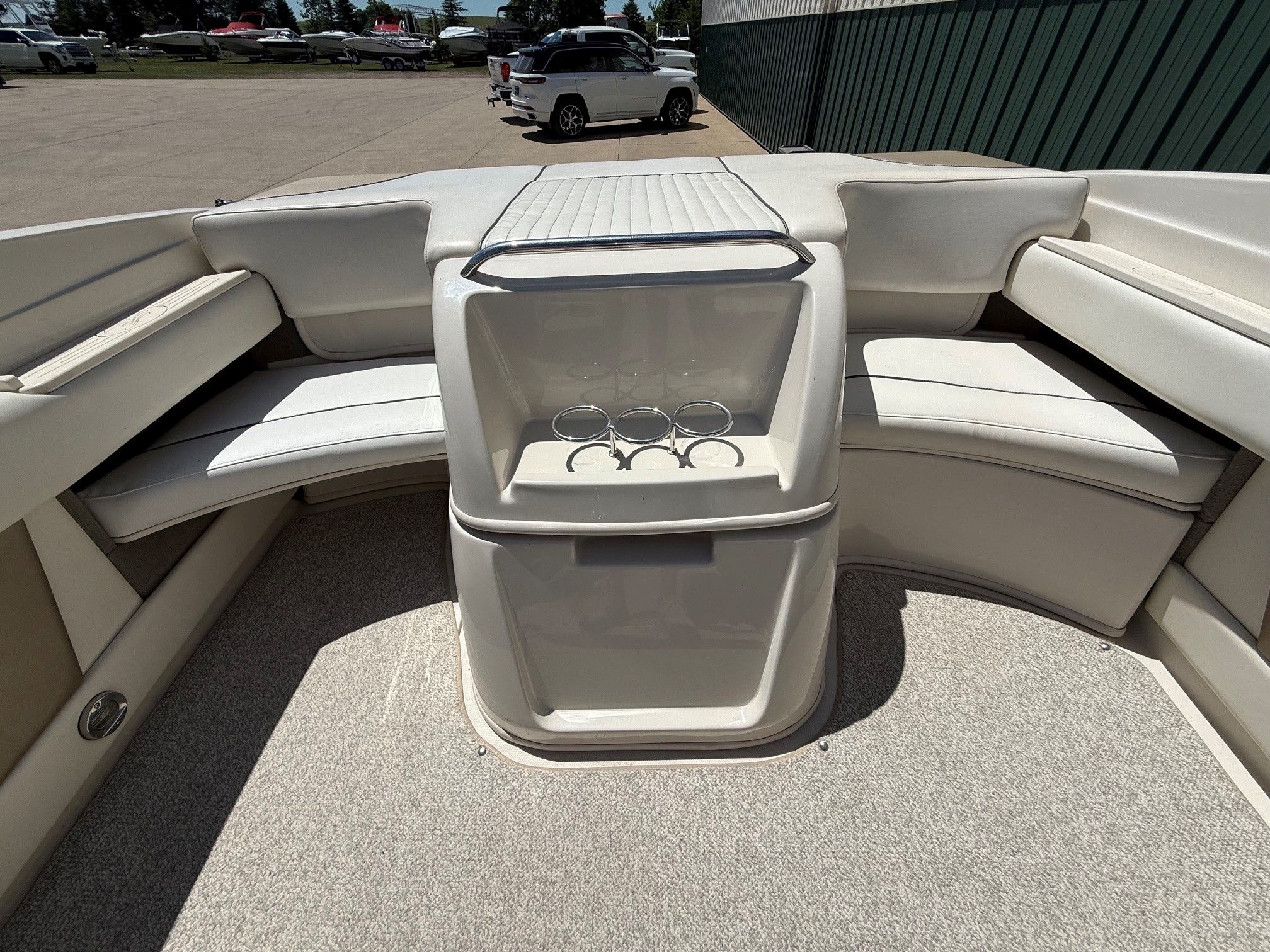 Interior of a 2007 Sea Ray 230 Select boat with seating area.