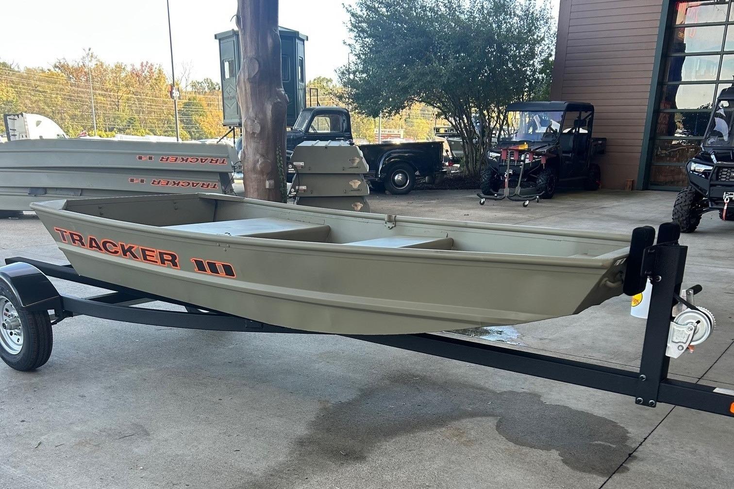 2026 Tracker Grizzly 10 Jon boat on trailer, displayed outdoors.