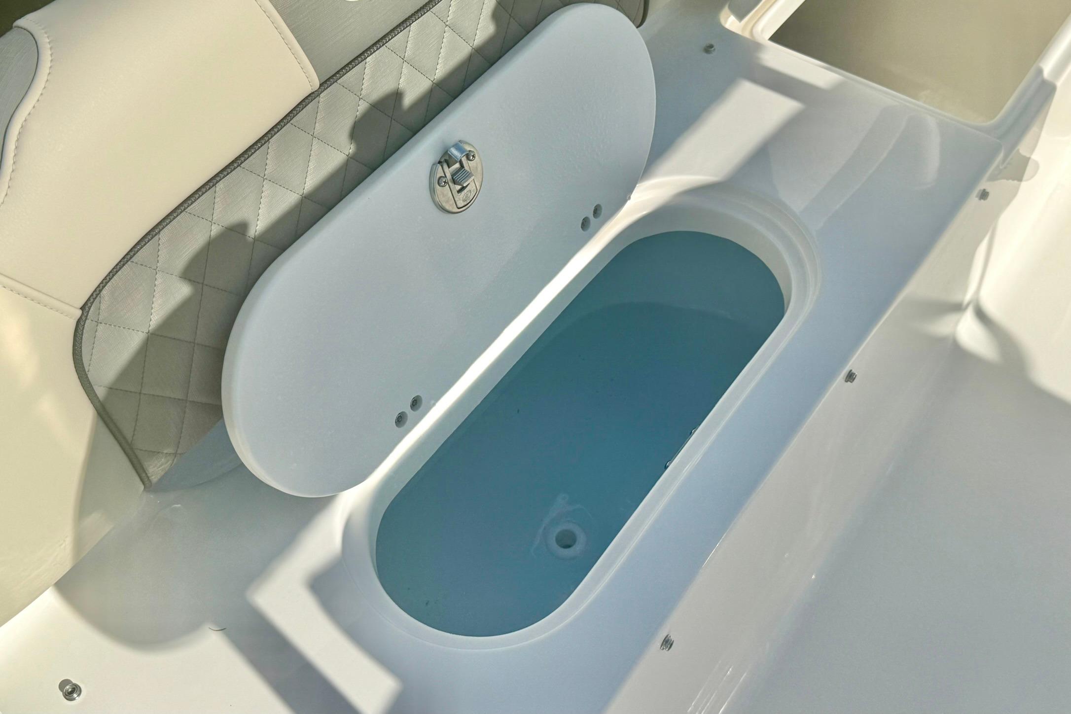 2026 Key West 189 FS boat interior with open storage compartment.