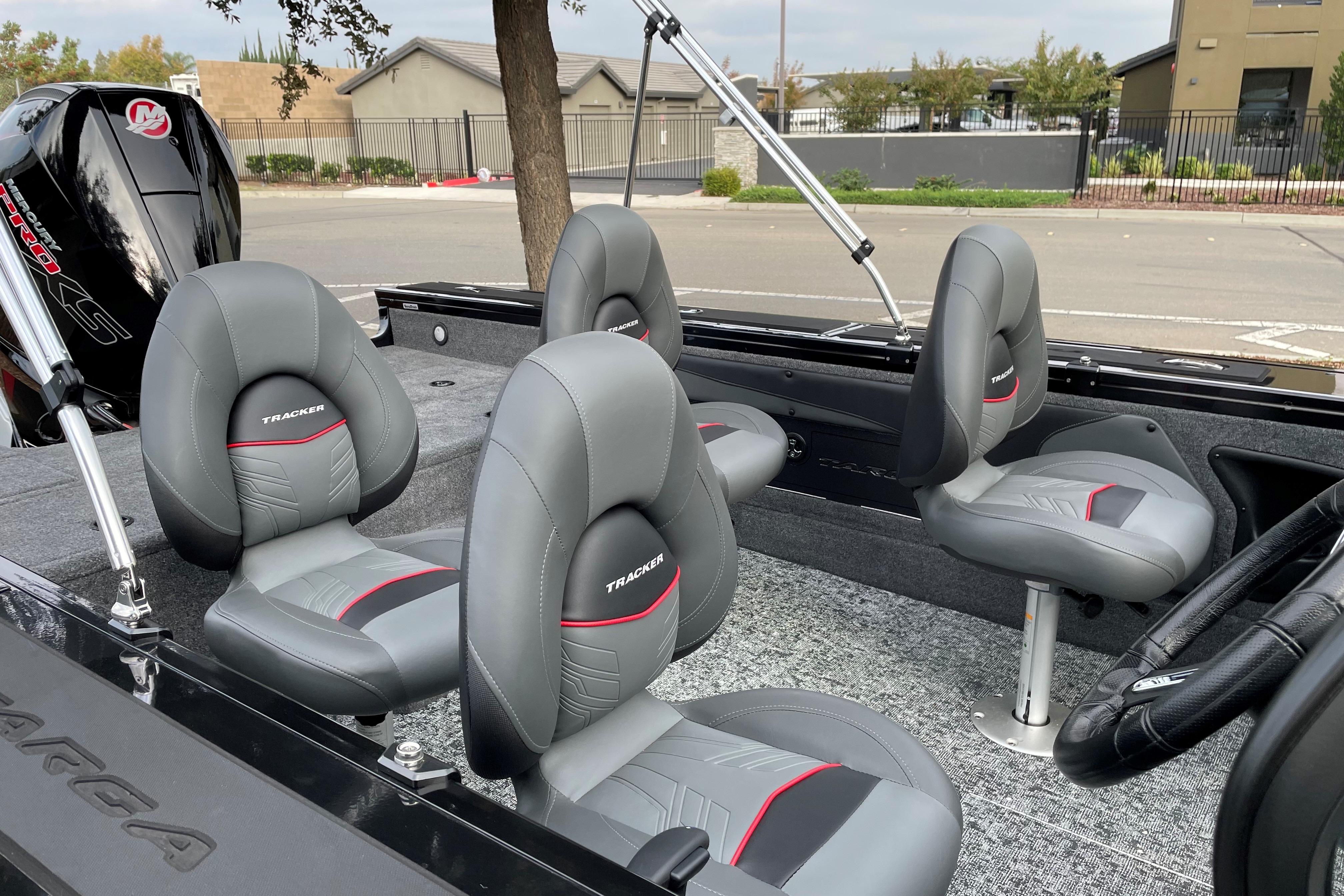 2026 Tracker Targa V-19 WT boat interior with gray and red seating.