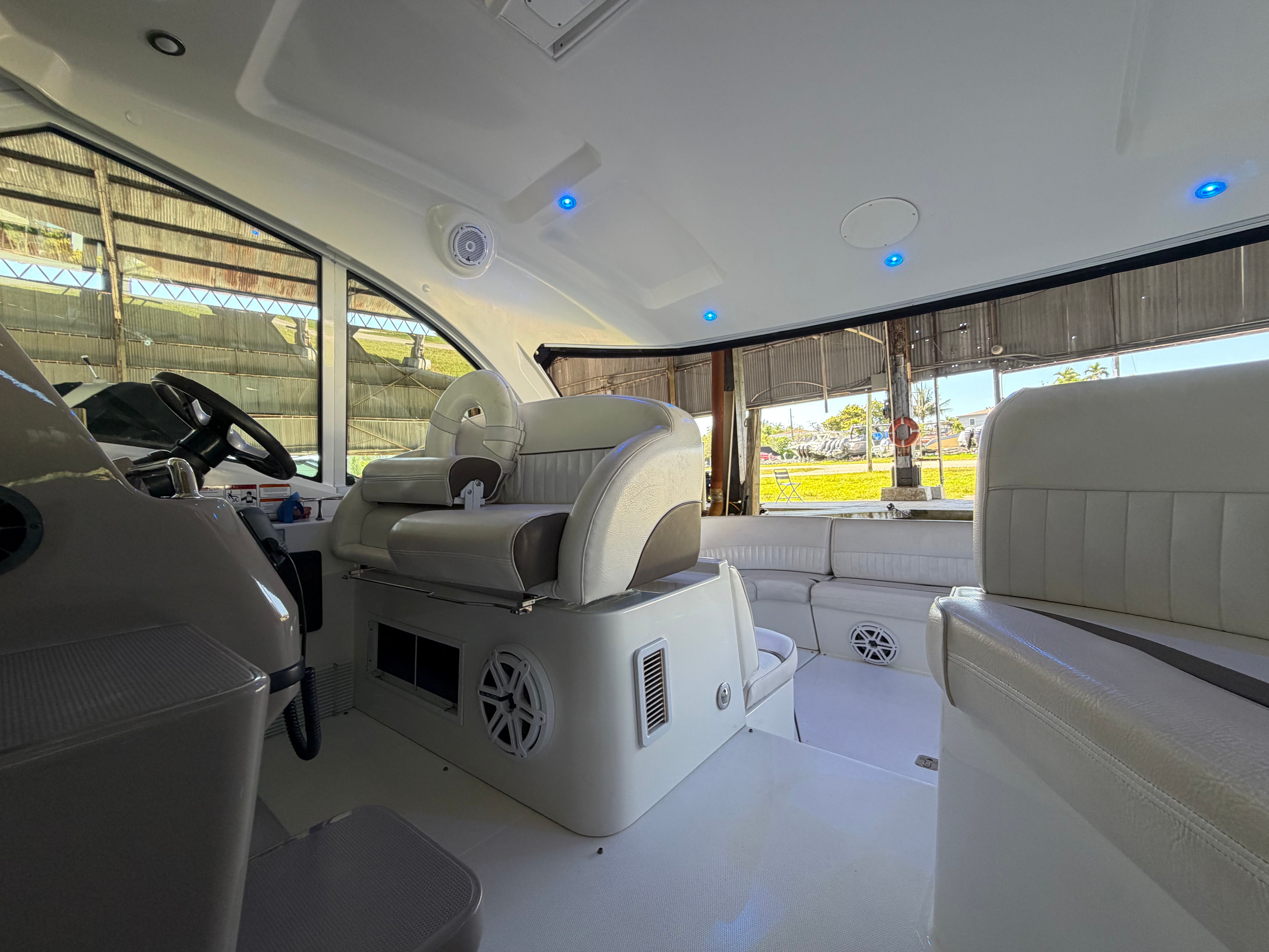 Interior of a 2012 Cruisers Yachts 430 Sports Coupe with luxurious seating.