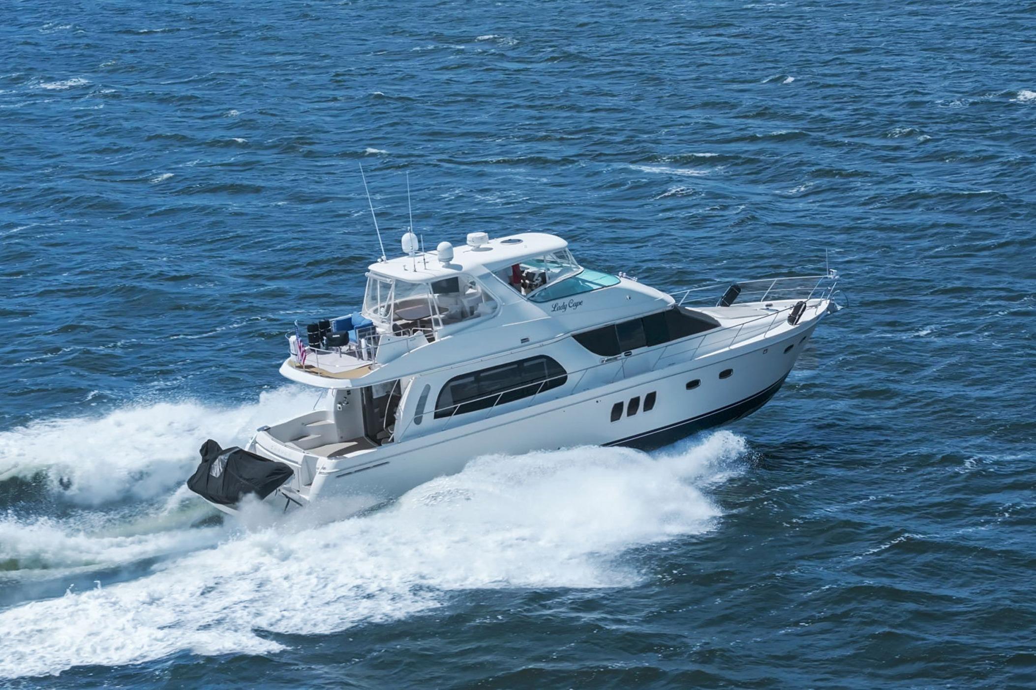 2008 Carver 56 Voyager SE yacht cruising on open water.