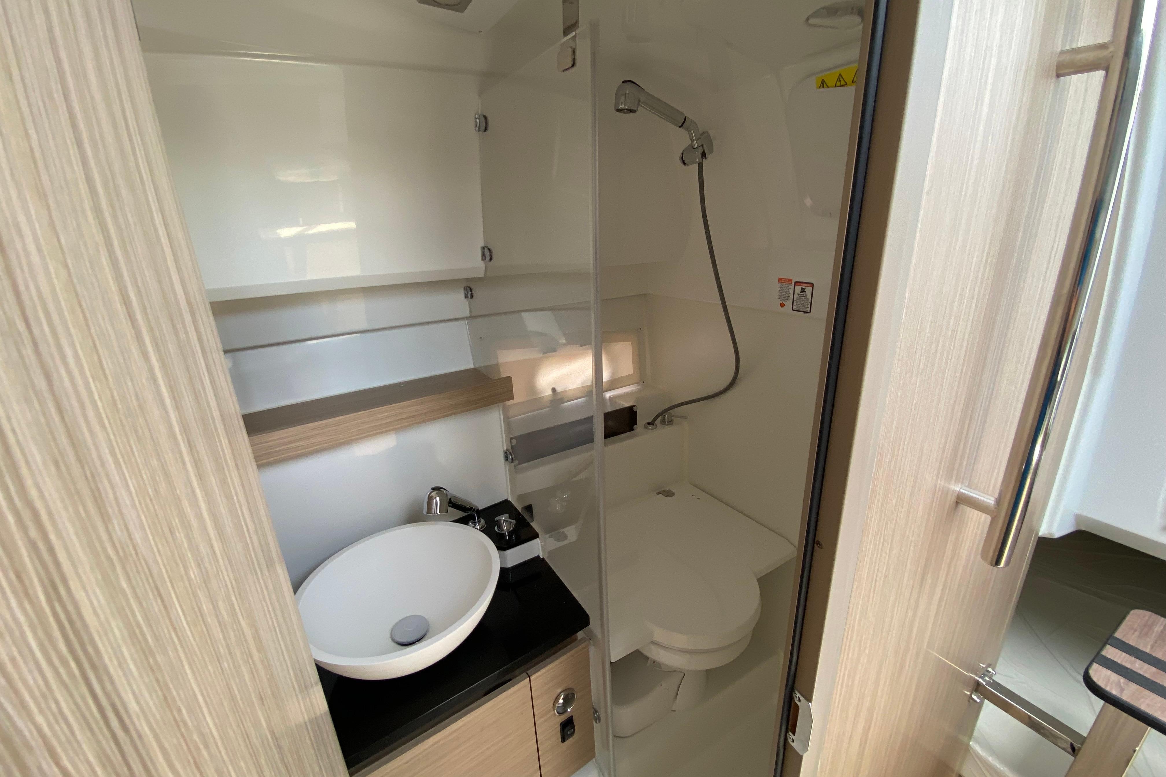 Modern bathroom interior of 2026 Jeanneau Leader 9.0 WA Series 2 boat.