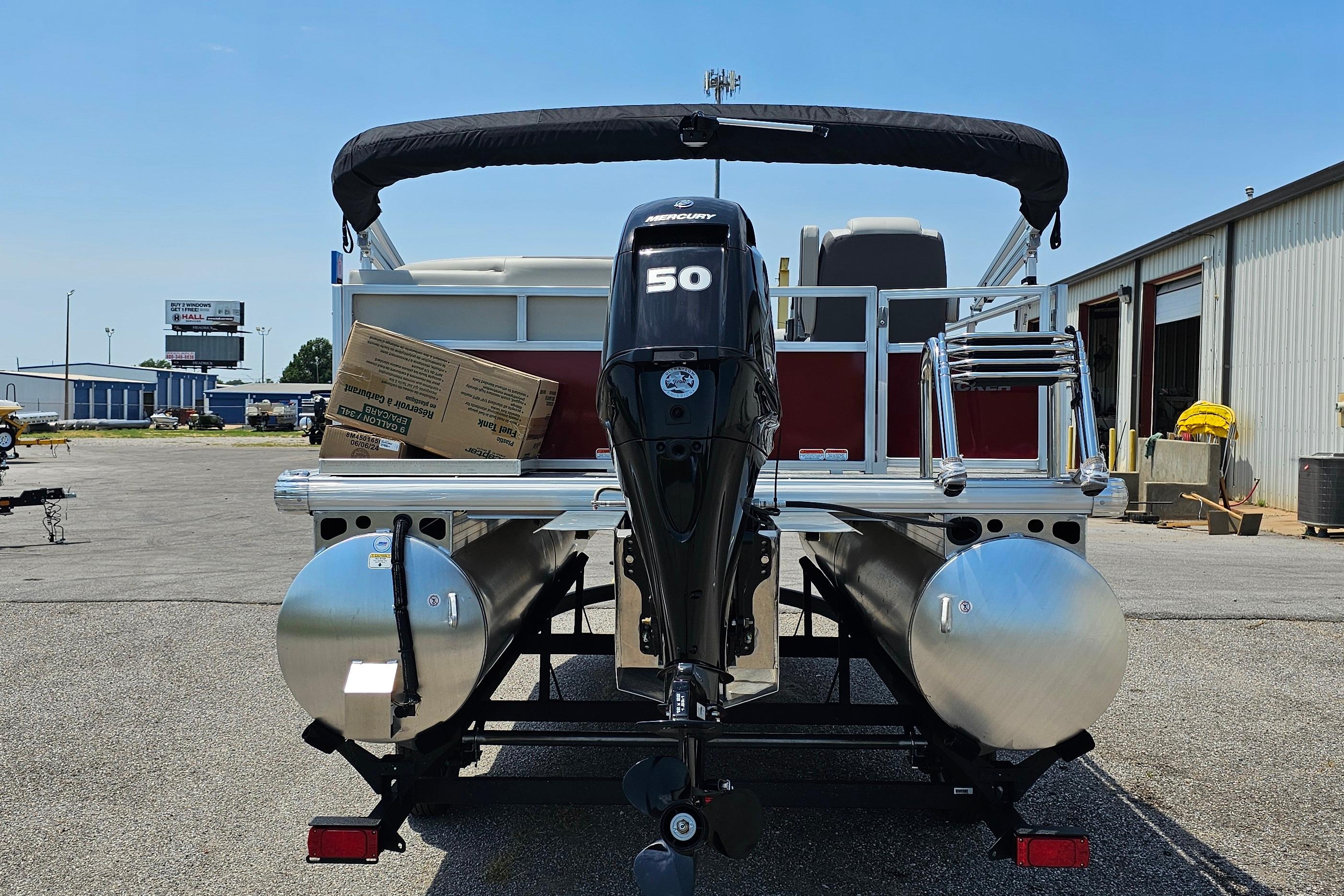 2026 Sun Tracker Bass Buggy 16 XL Select pontoon boat with Mercury 50 engine.