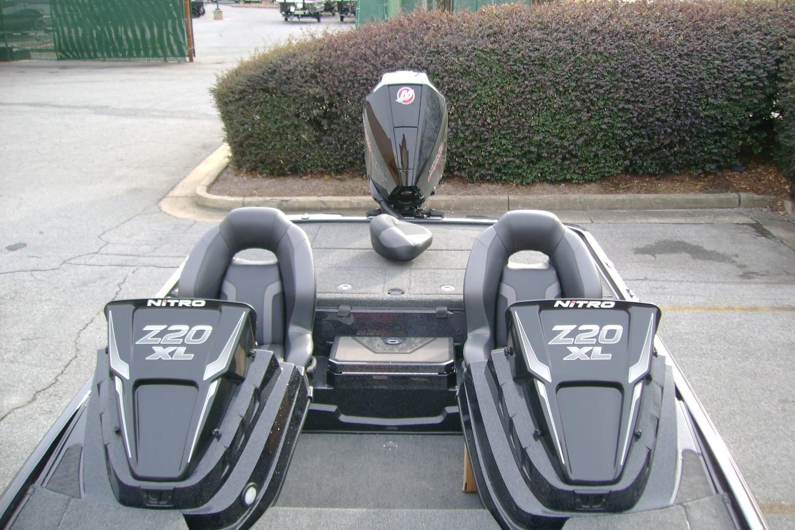 2026 Nitro Z20 XL Pro boat with dual seats and powerful engine, parked outdoors.